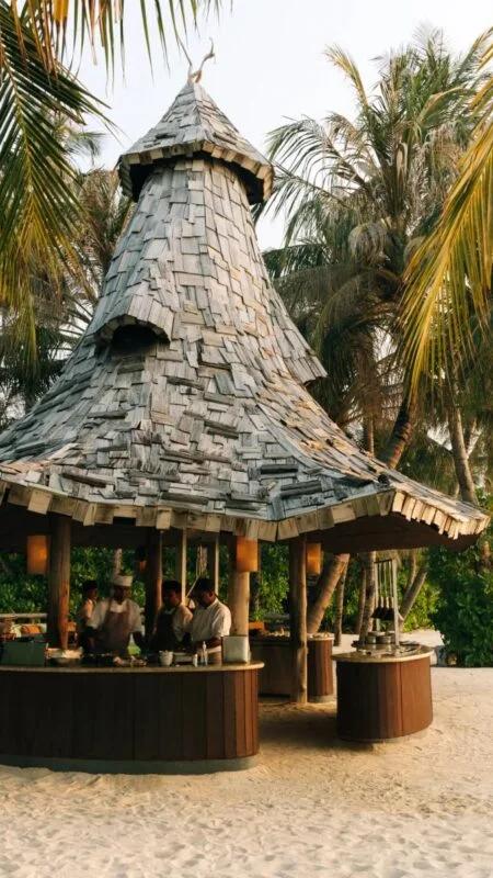 The open-flame grill kitchen at Primitive, Soneva Jani's live-fire restaurant