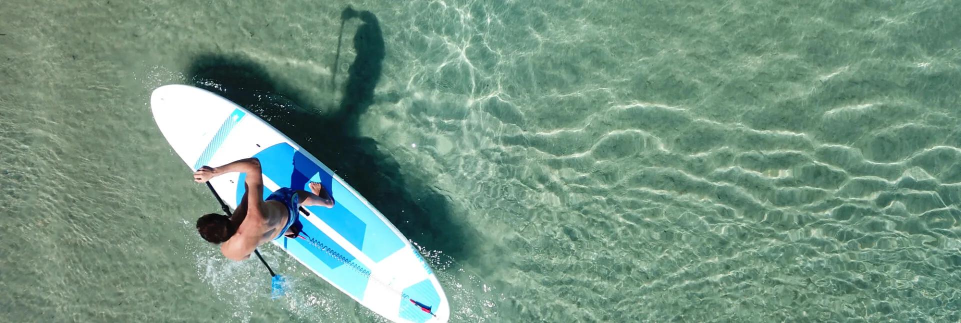 Stand-up paddleboarding in the lagoon off JA Manafaru