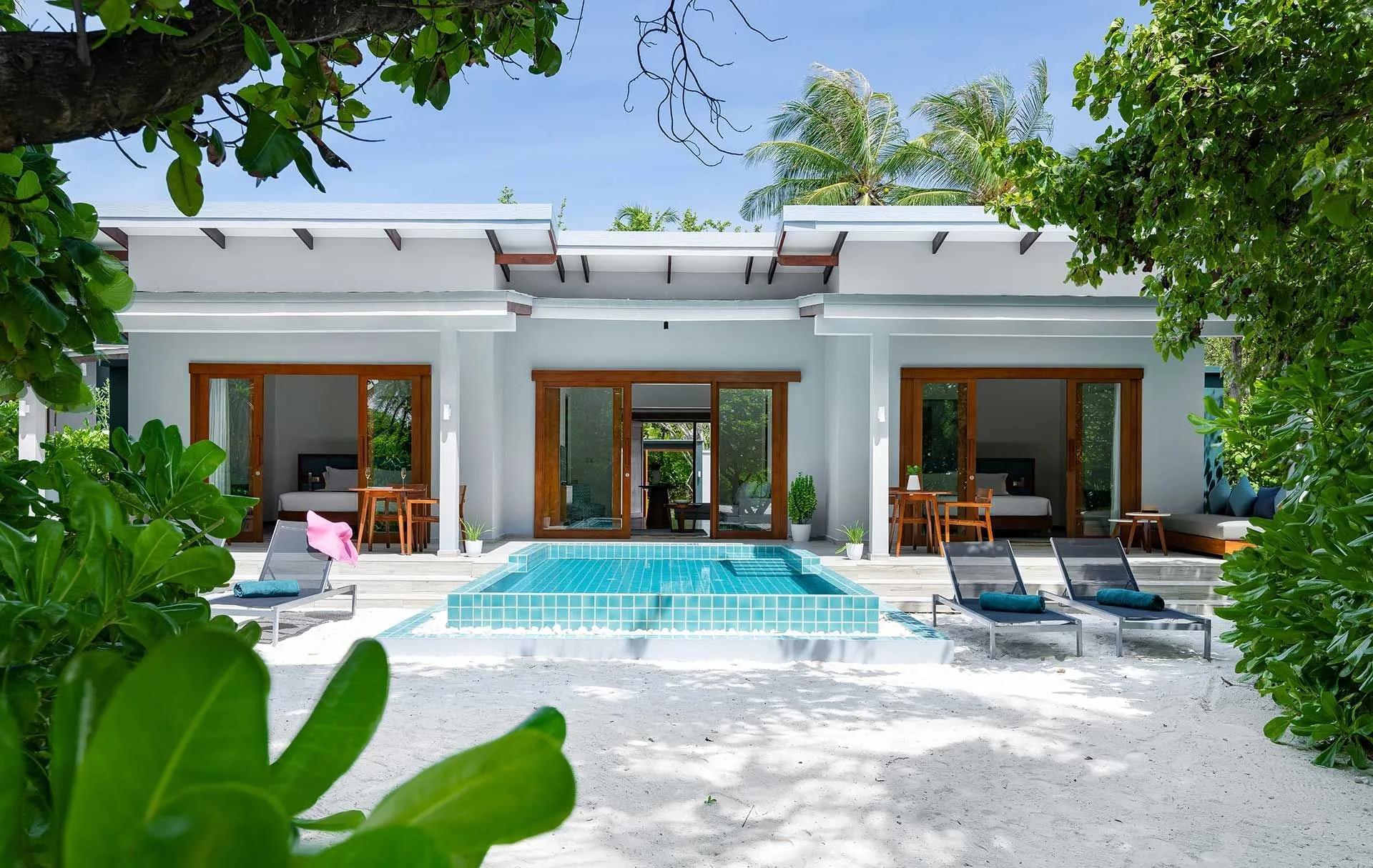The exterior and private pool of a Sunset Two Bedroom Villa with Pool at Ifuru Island Maldives