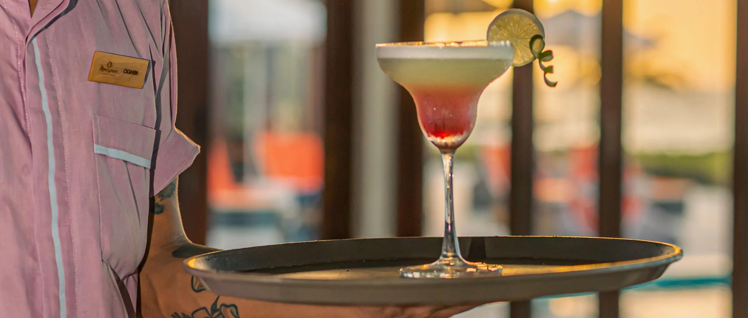 A cocktail served poolside at Sunset Pool Bar