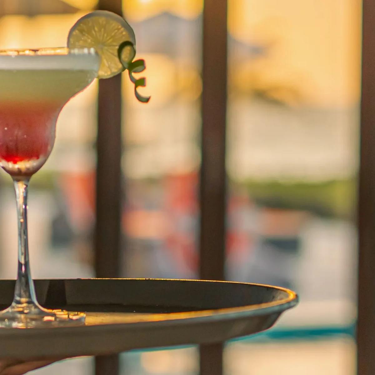 A cocktail served poolside at Sunset Pool Bar