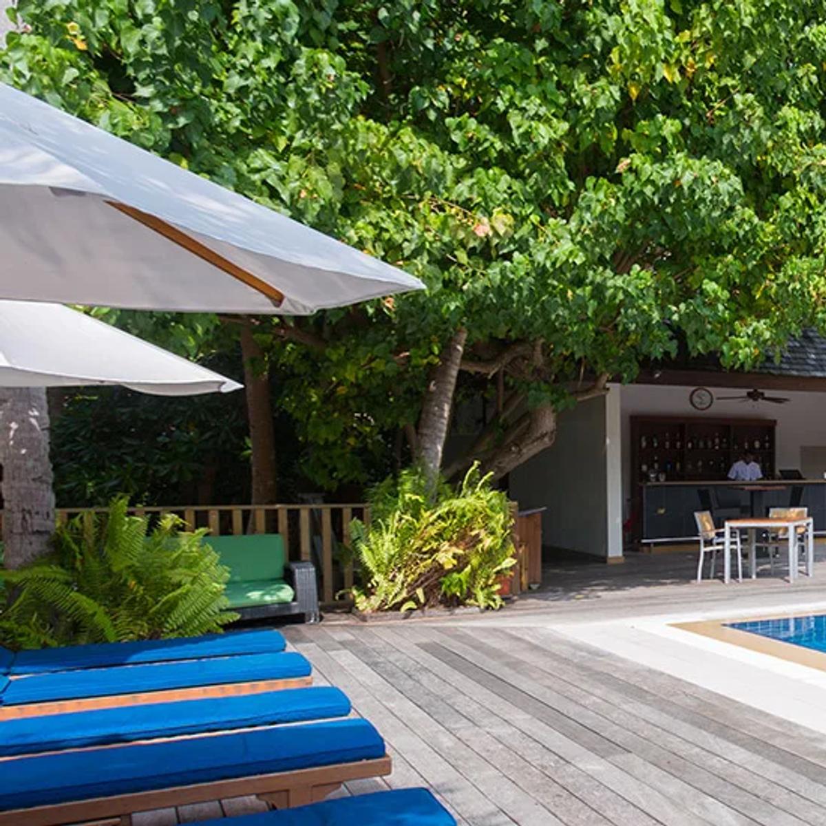 Boashi Café's poolside bar and lounge deck, beside the Boashi Pool