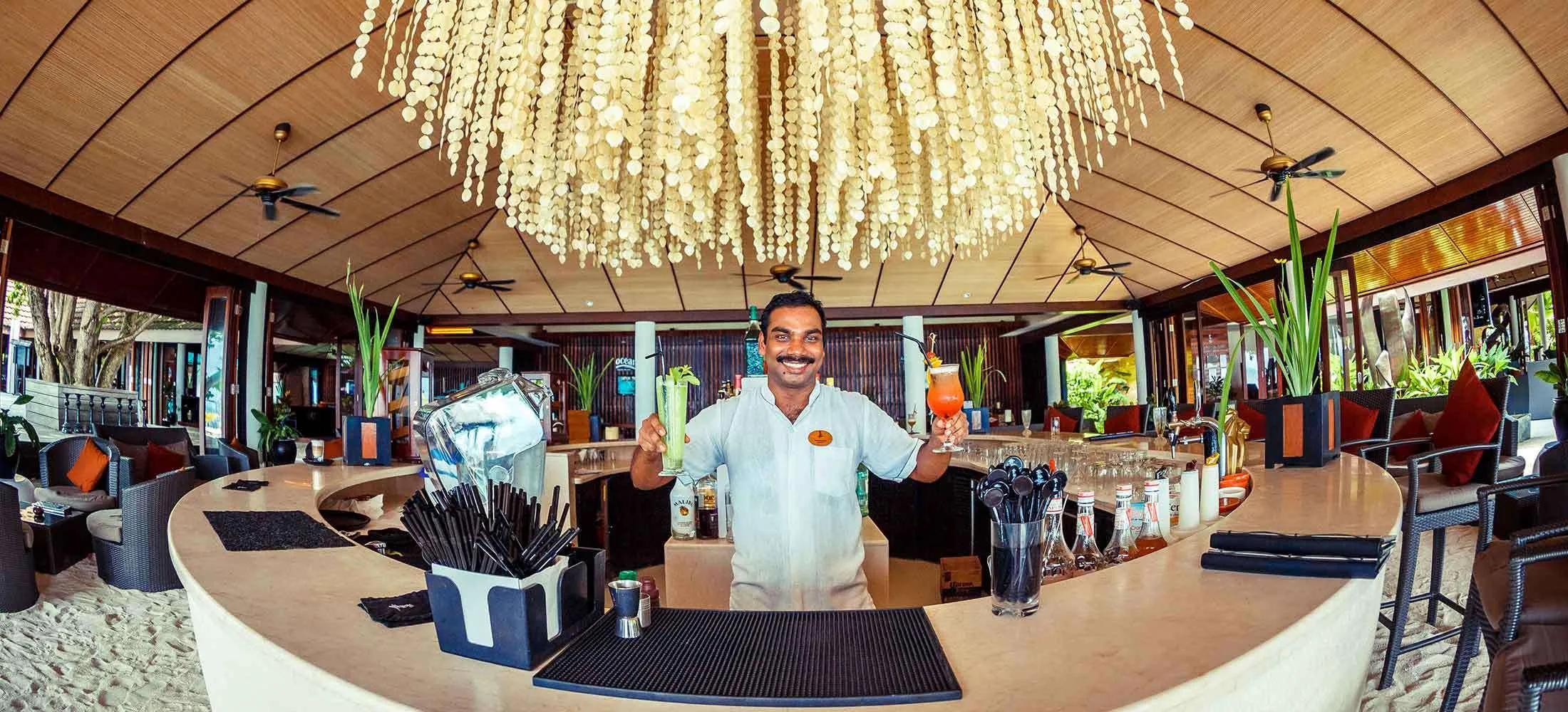 The outdoor terrace at The Spirit Bar, Lily Beach Resort & Spa