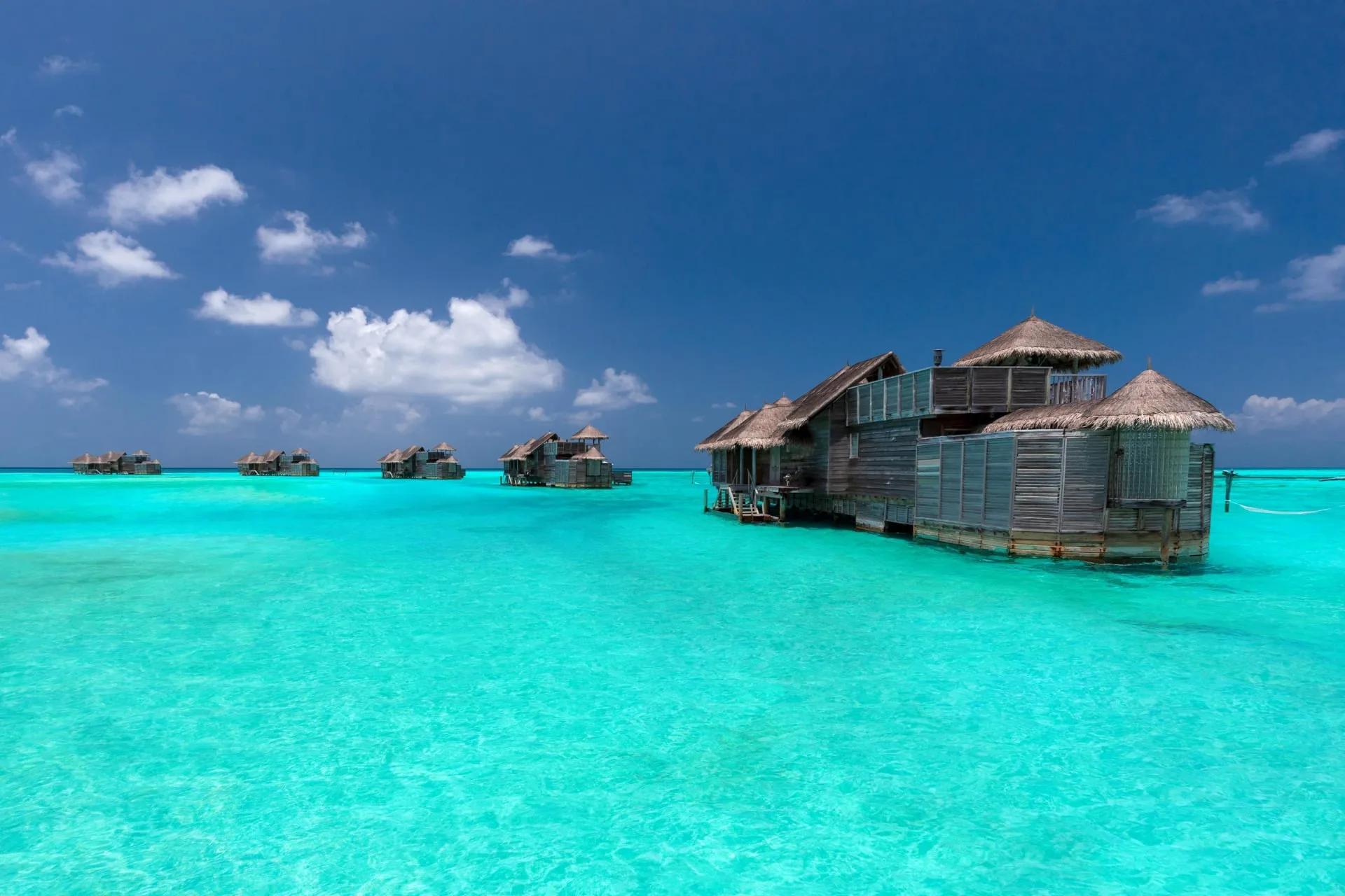 A Crusoe Residence at Gili Lankanfushi, reached by private motorised boat or the resort's pontoon