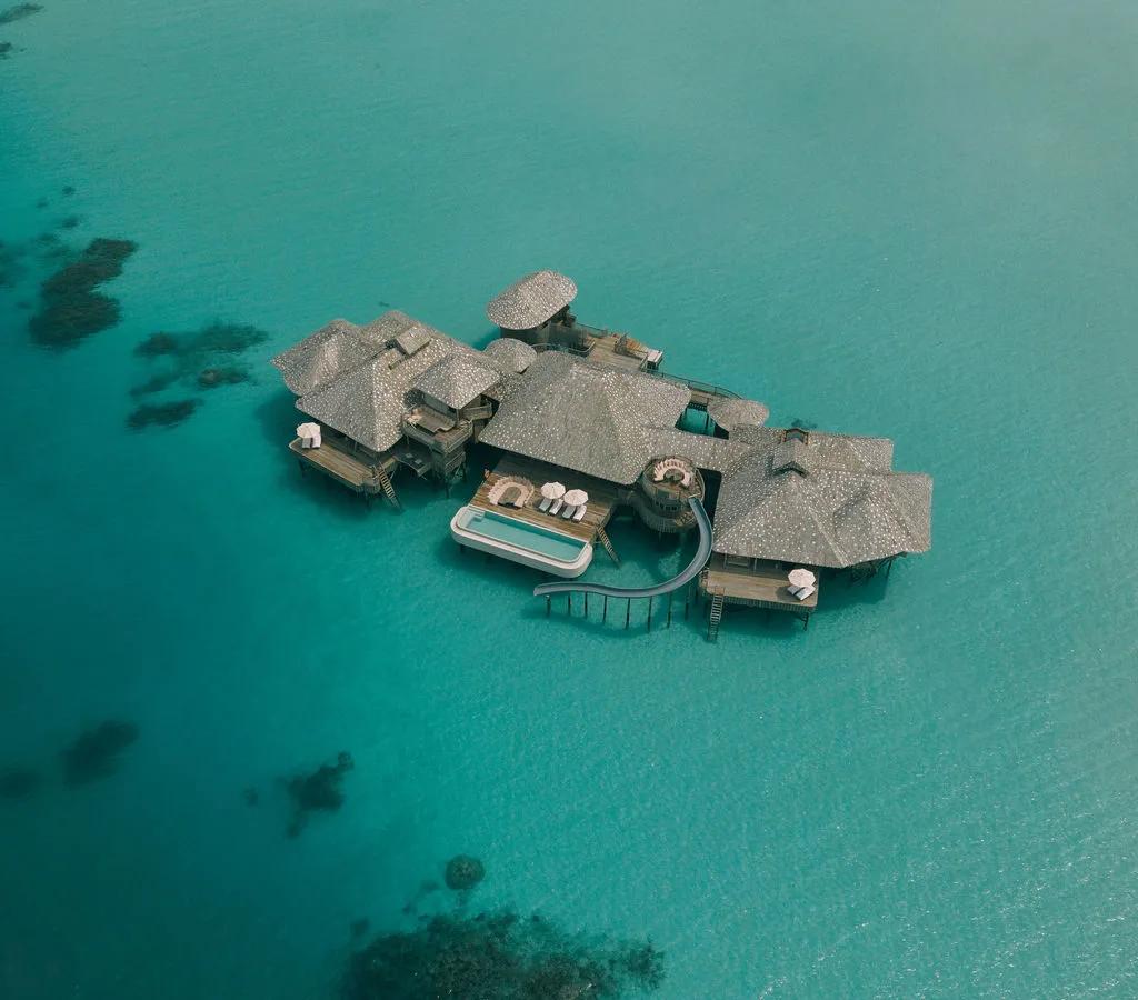 The One-Bedroom Overwater Sea Loft's deck and pool at Soneva Secret