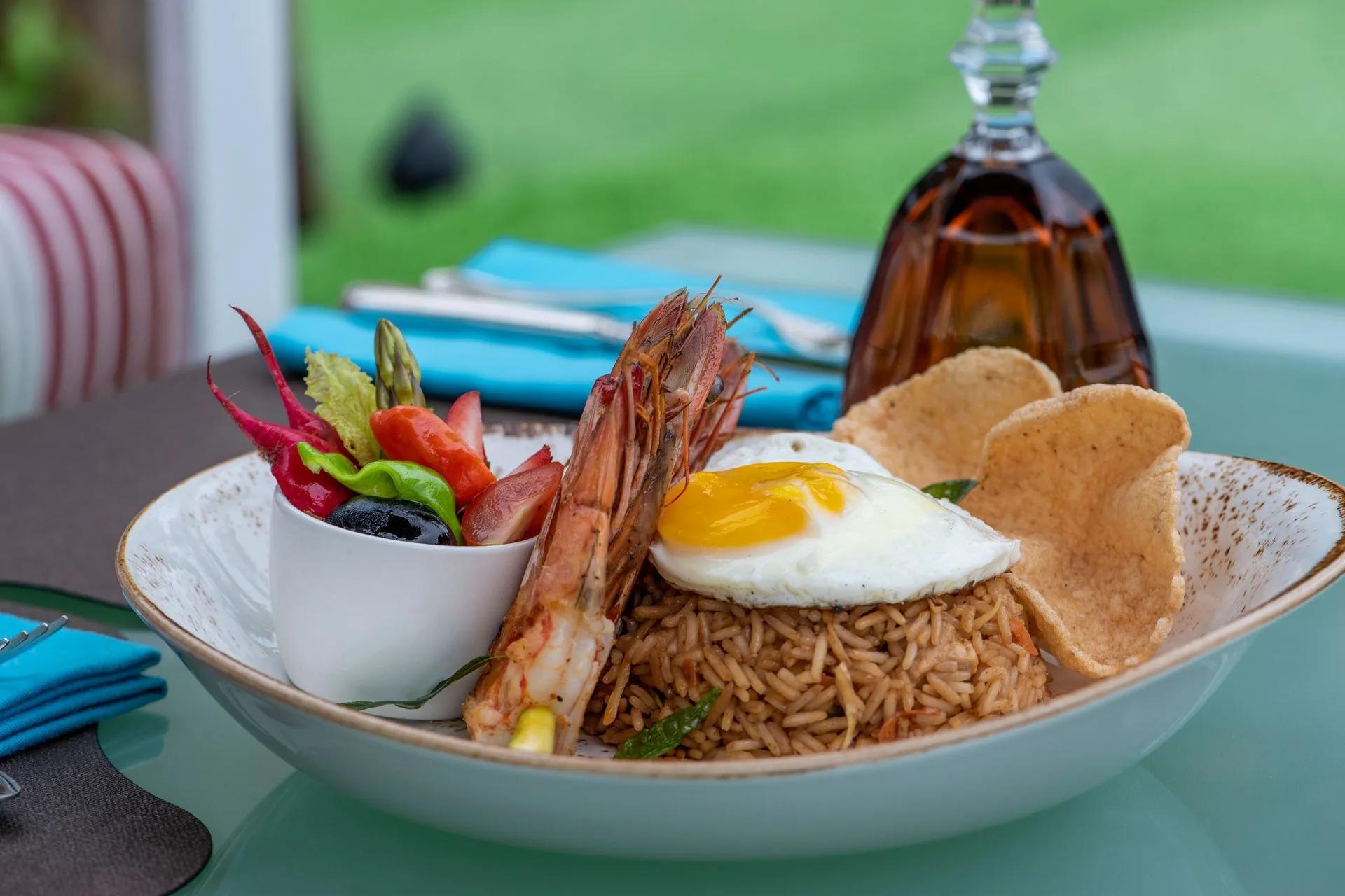 Green Carpet, You & Me Maldives' poolside restaurant serving light, healthy cuisine