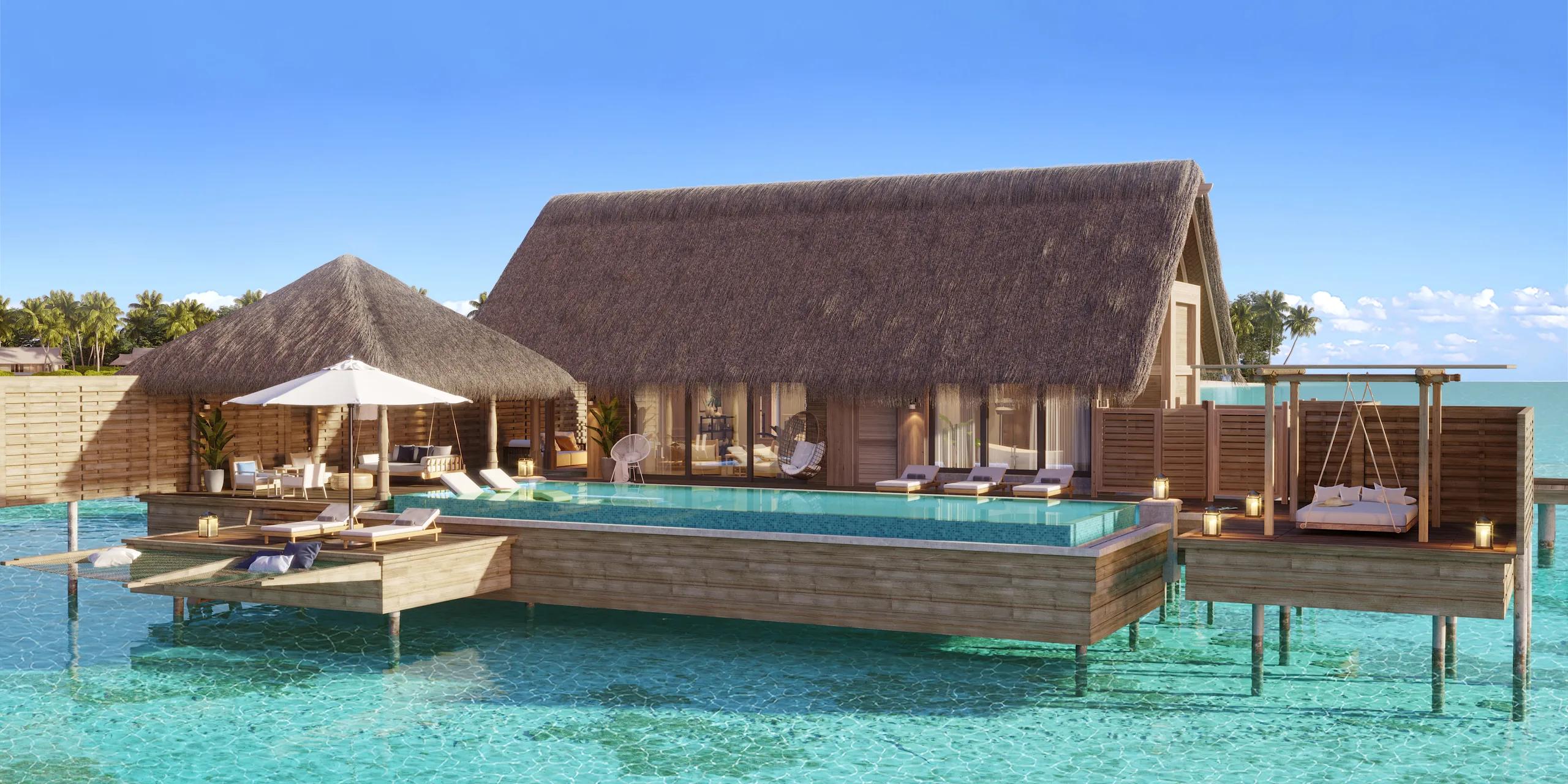Exterior view of an Overwater Villa at Waldorf Astoria Maldives Ithaafushi, its private pool suspended above the lagoon
