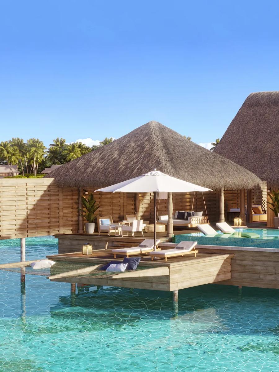 Exterior view of an Overwater Villa at Waldorf Astoria Maldives Ithaafushi, its private pool suspended above the lagoon