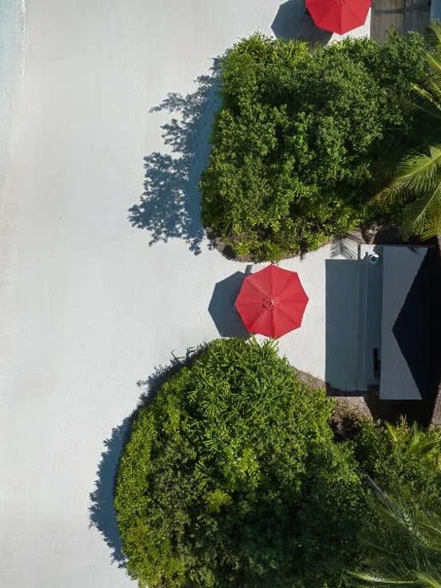 Aerial view of a Deluxe Beach Villa's beachfront position at Niyama