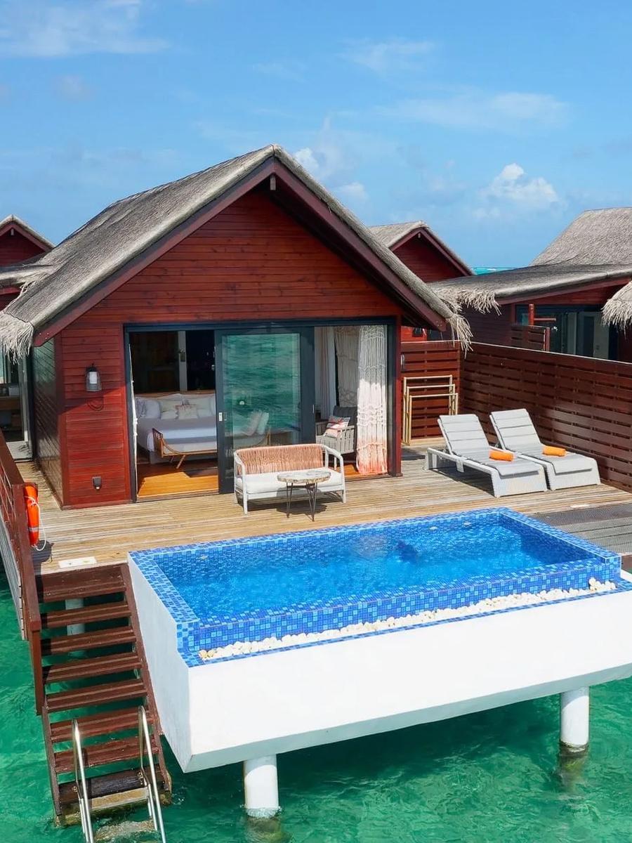 The overwater deck and private plunge pool of a Pool Water Villa