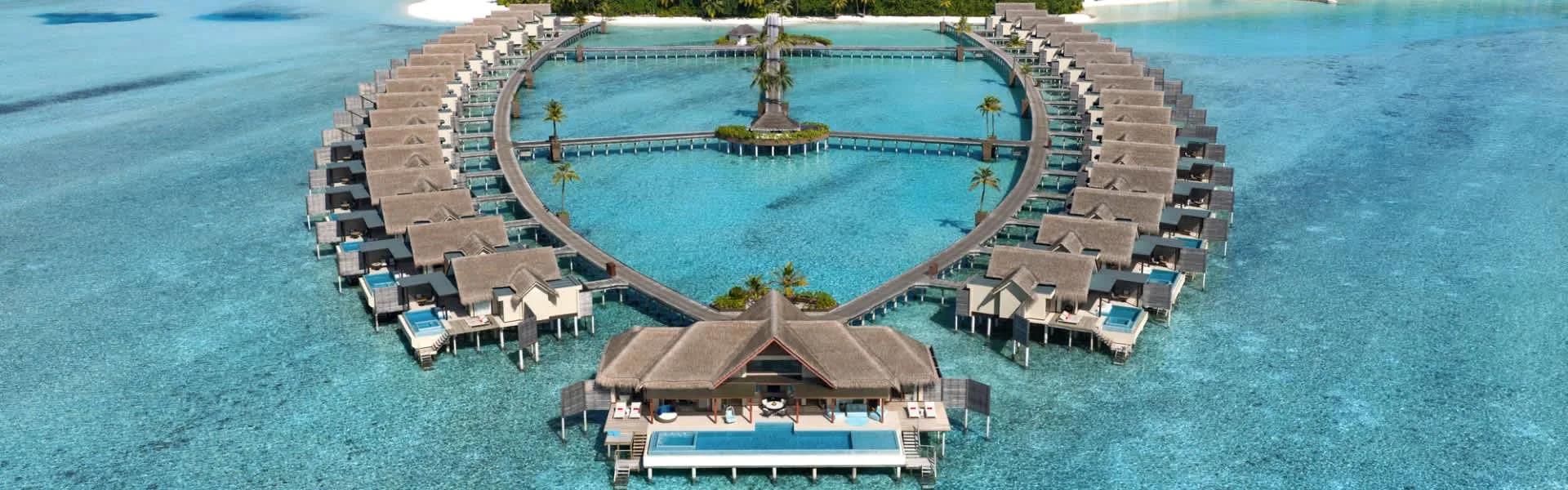 Aerial view of the overwater pool villas alongside Chill island at Niyama Private Islands
