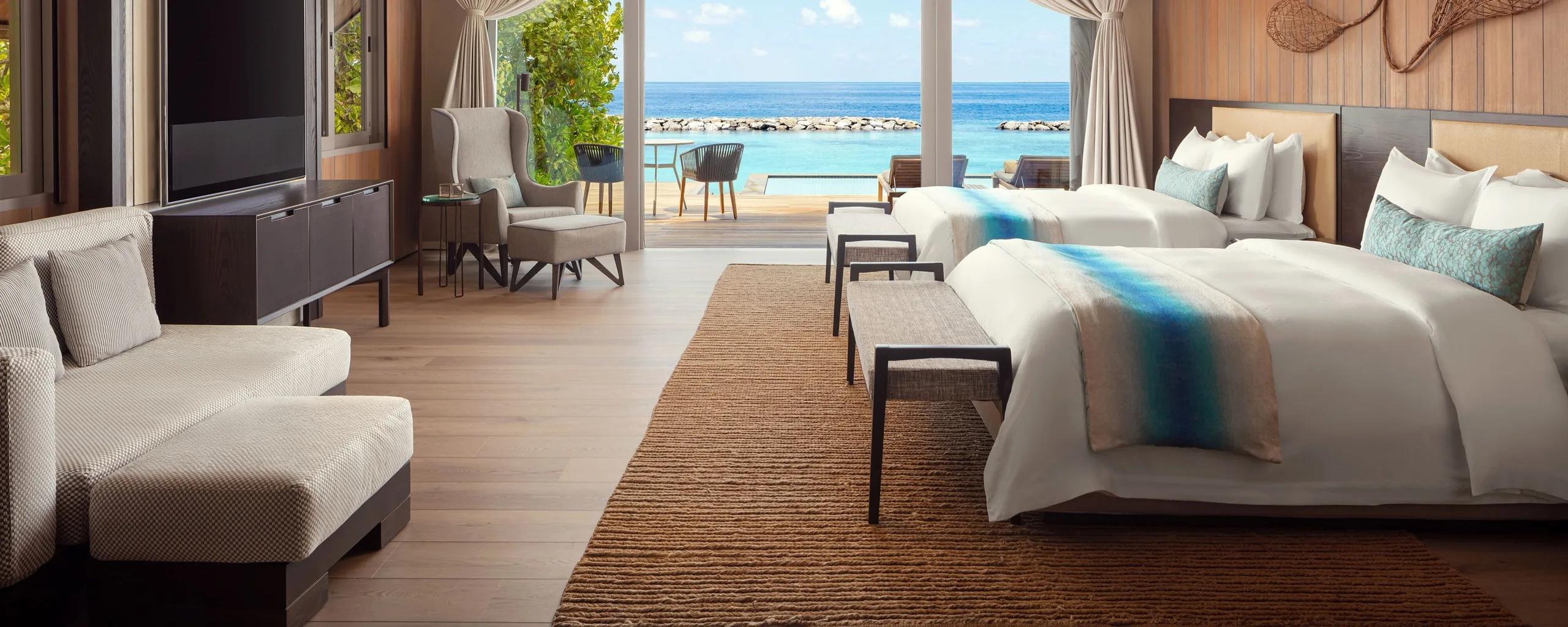 The living area of a Two Bedroom Ocean Villa at The St. Regis Maldives Vommuli Resort