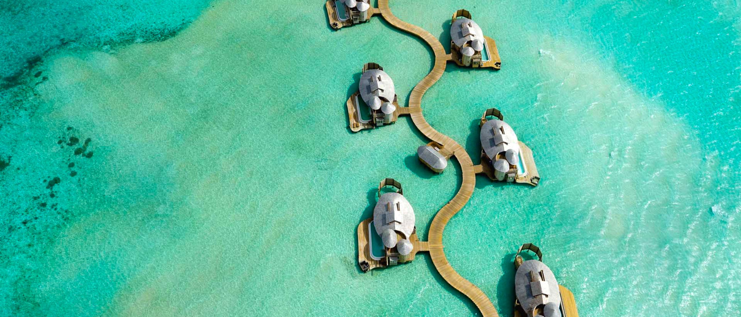 Soneva Jani Maldives overwater villas aerial view in Noonu Atoll