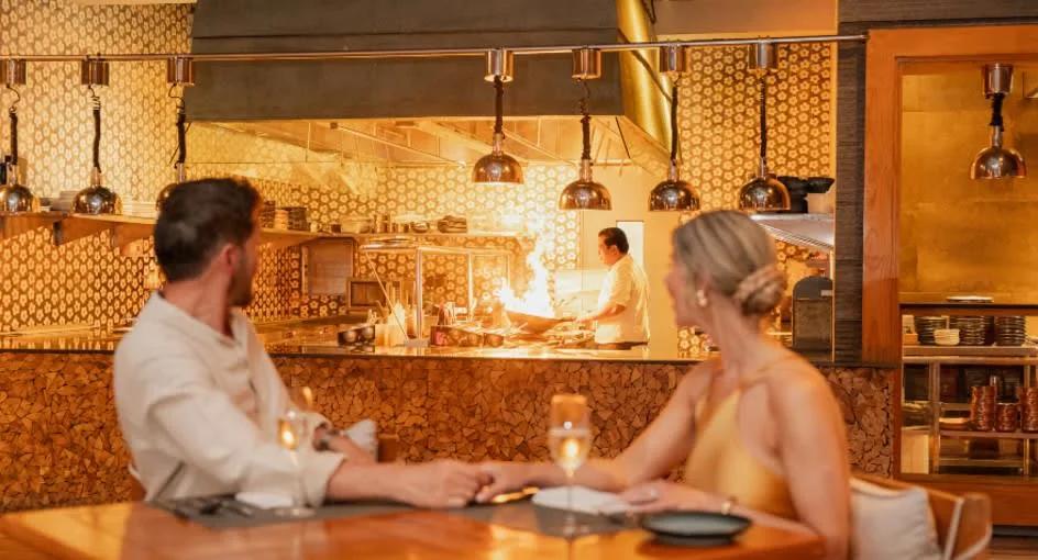 SPICE restaurant's overwater dining room at Anantara Kihavah Maldives Villas