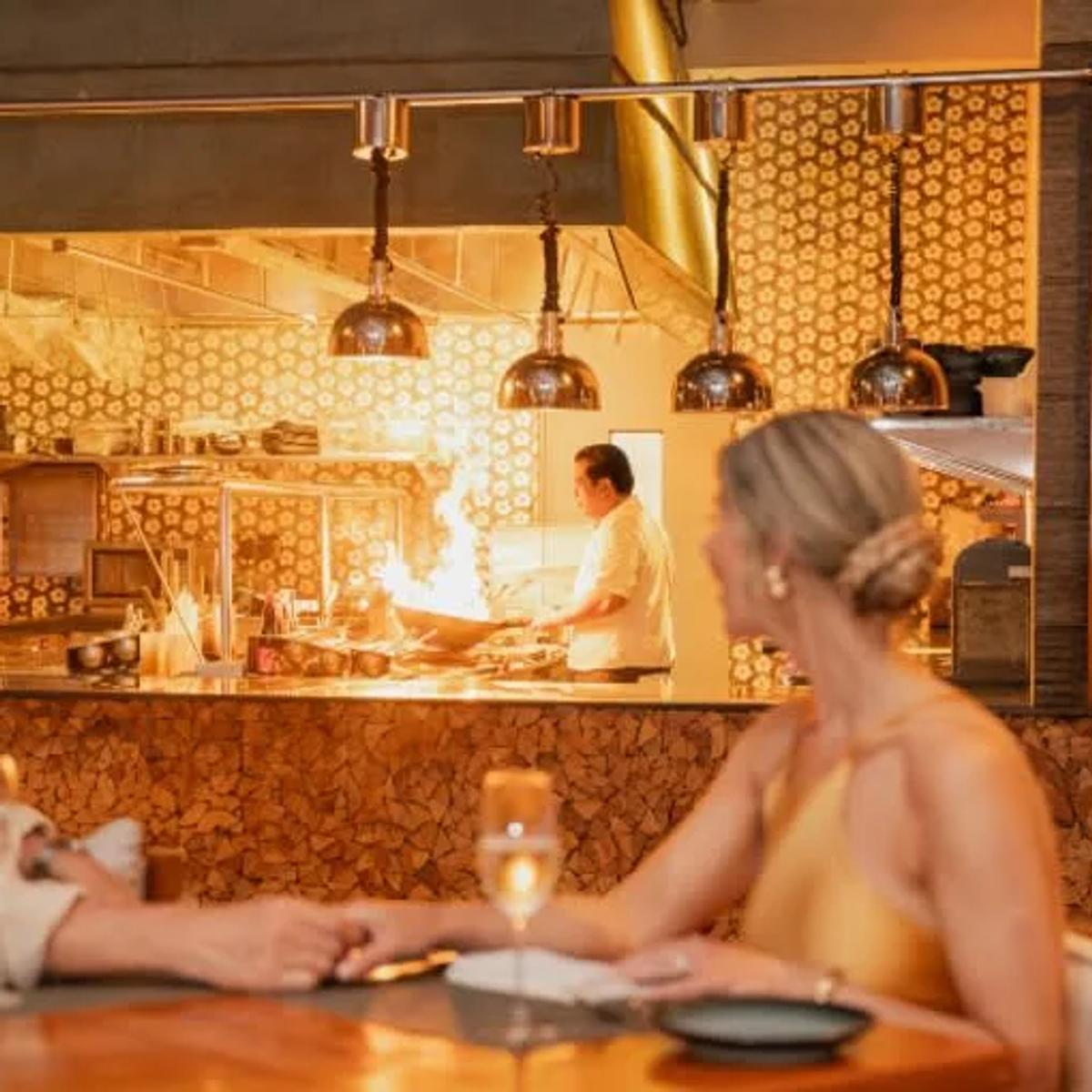 SPICE restaurant's overwater dining room at Anantara Kihavah Maldives Villas