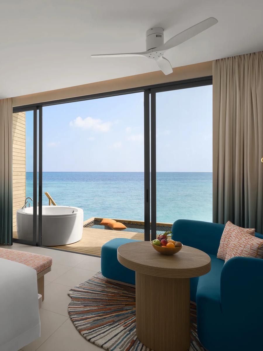 An Overwater Sunrise Villa with Jacuzzi, terrace facing the sunrise side of the lagoon