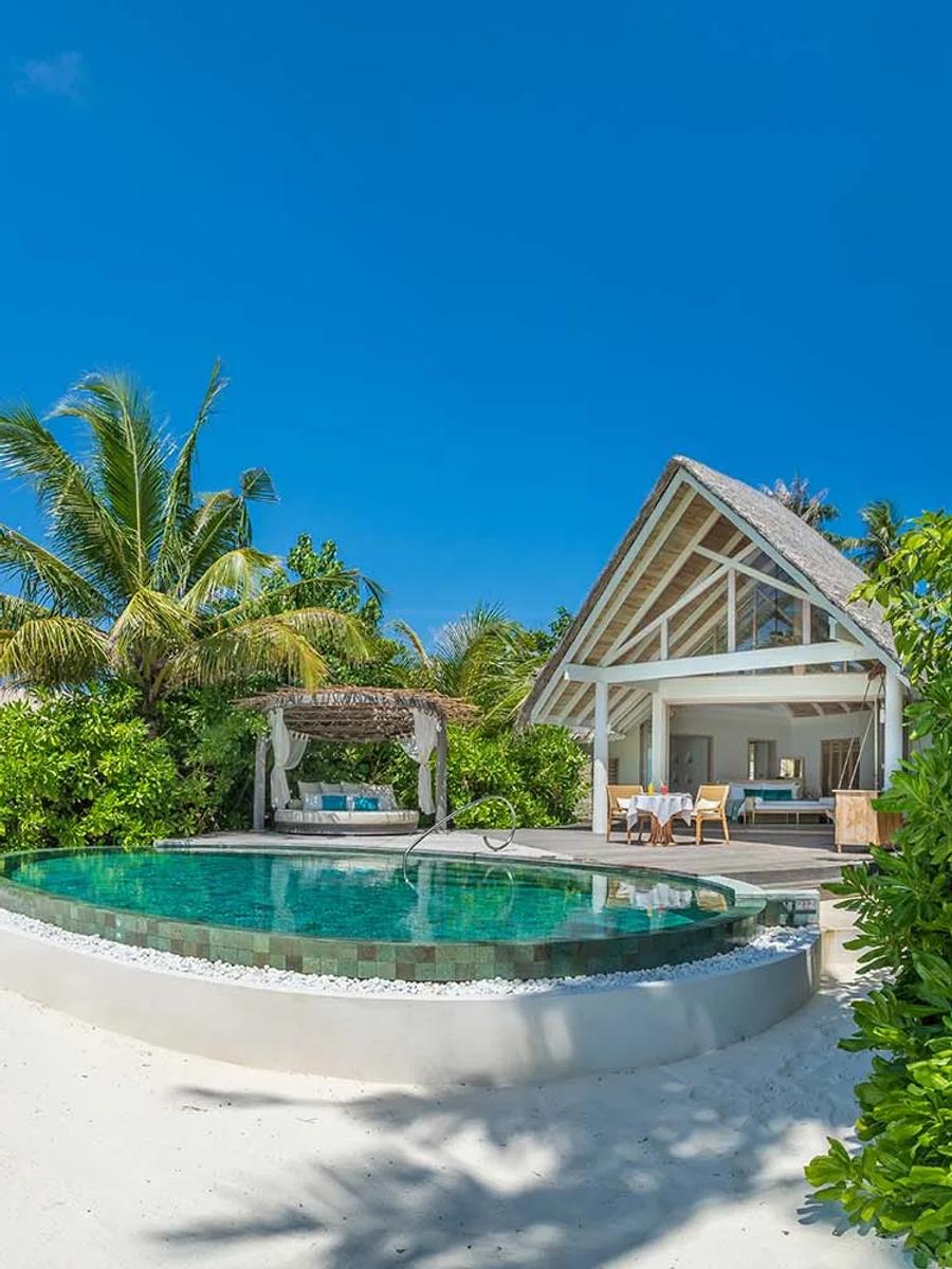 A Beach Pool Villa at Milaidhoo, set behind its own stretch of beach with a private pool.