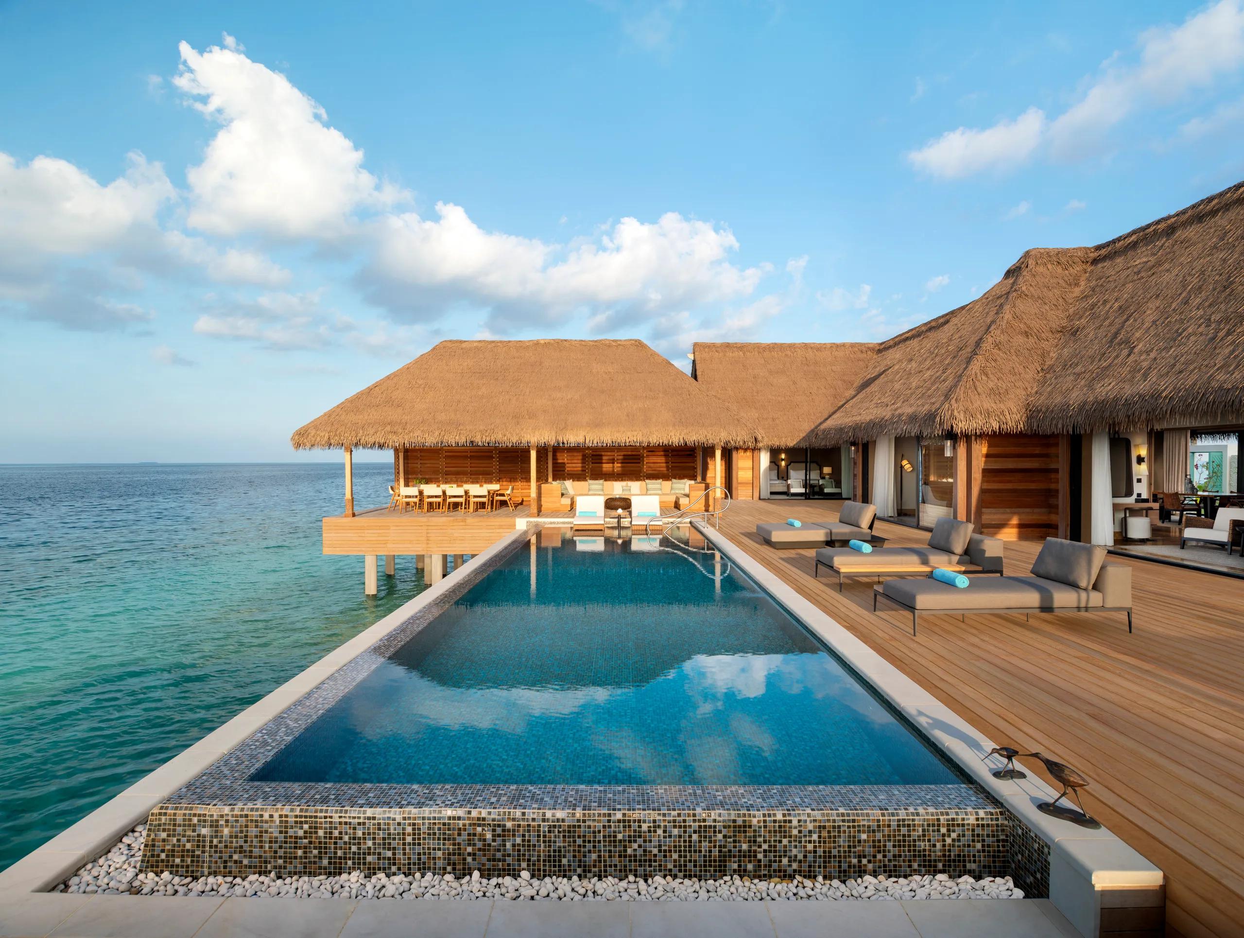 The private pool of a Two Bedroom Reef Villa at Waldorf Astoria Maldives Ithaafushi, set beside the lagoon