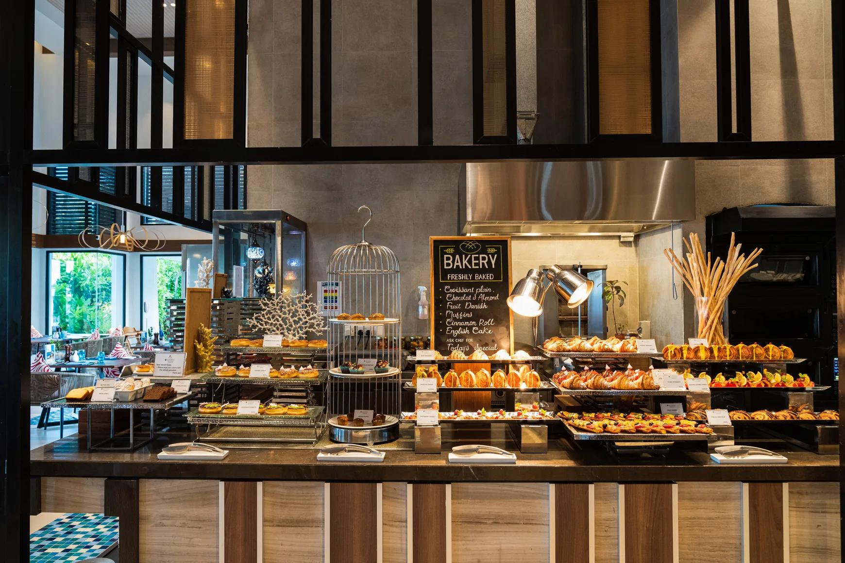 The dining room at Mélange with its live-cooking stations in view