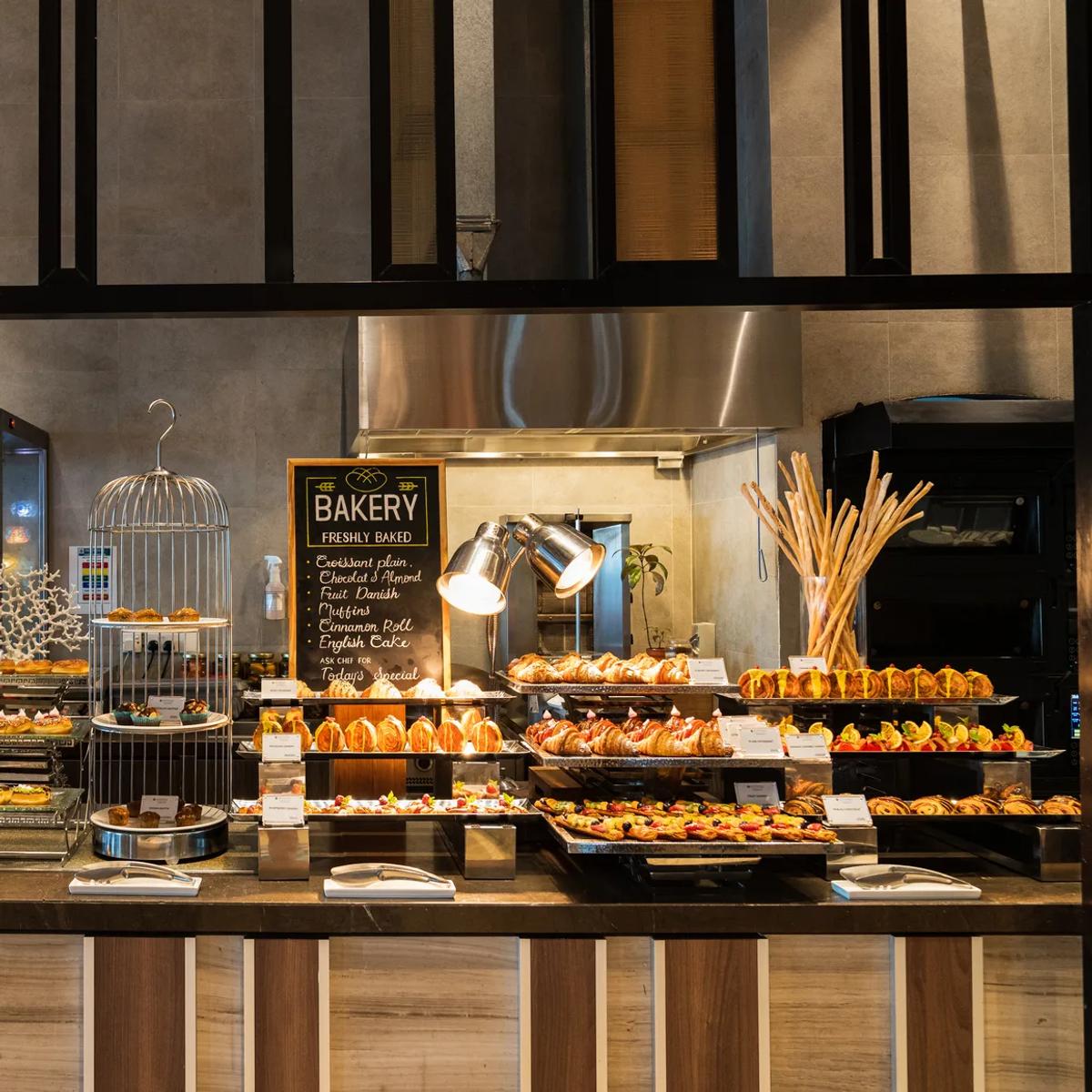 The dining room at Mélange with its live-cooking stations in view