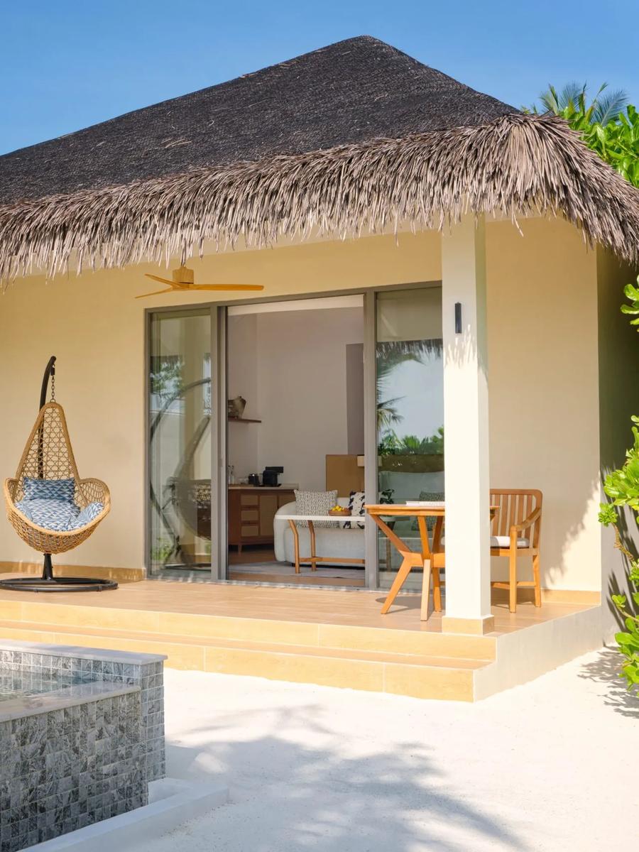 A Beach Pool Villa's bedroom, pool deck and private pool at dusitD2 Feydhoo Maldives