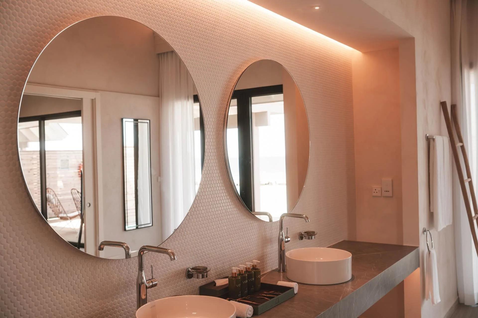 The double-vanity bathroom of a 2-Bedroom Beach Pool Villa