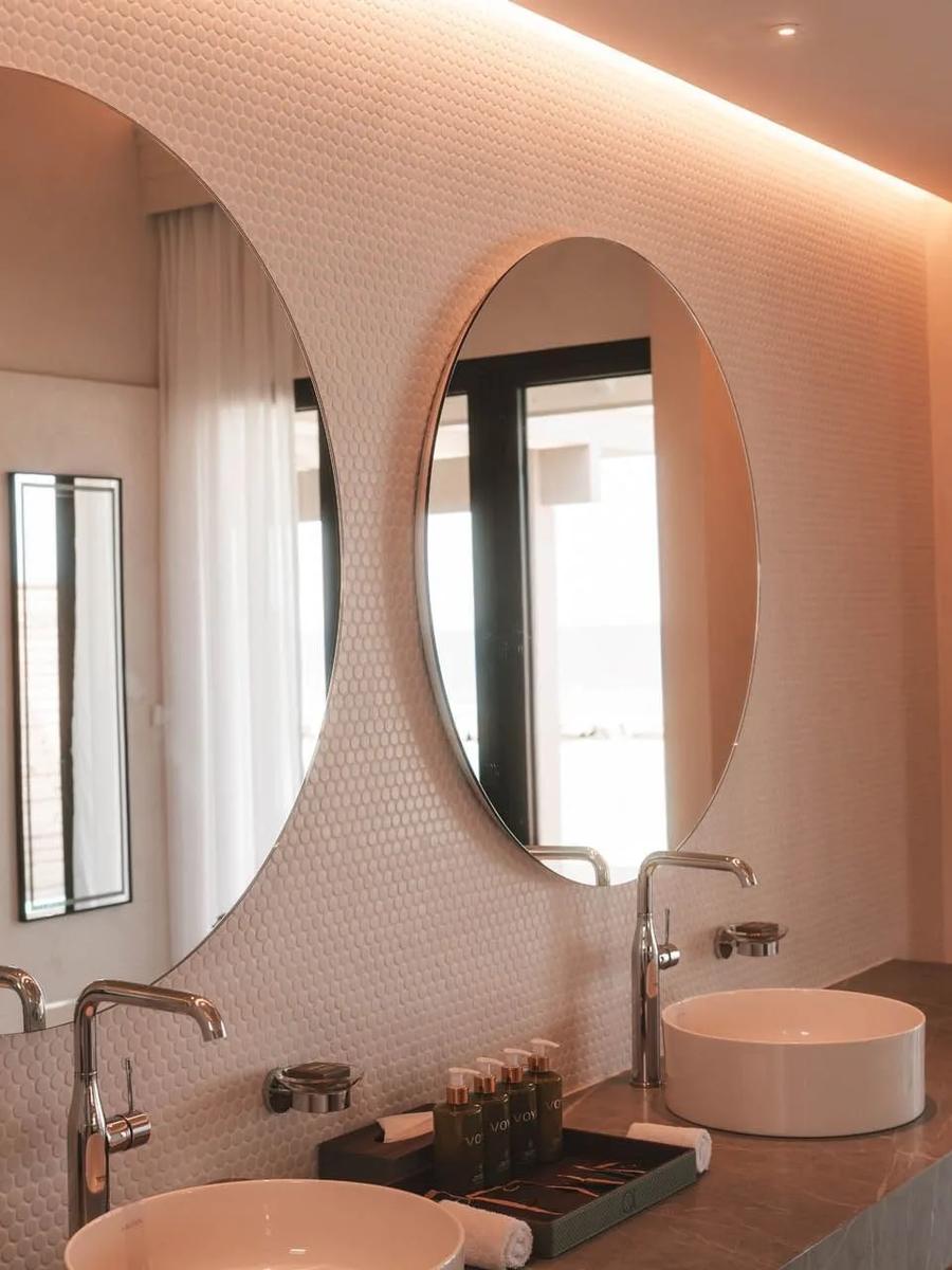 The double-vanity bathroom of a 2-Bedroom Beach Pool Villa