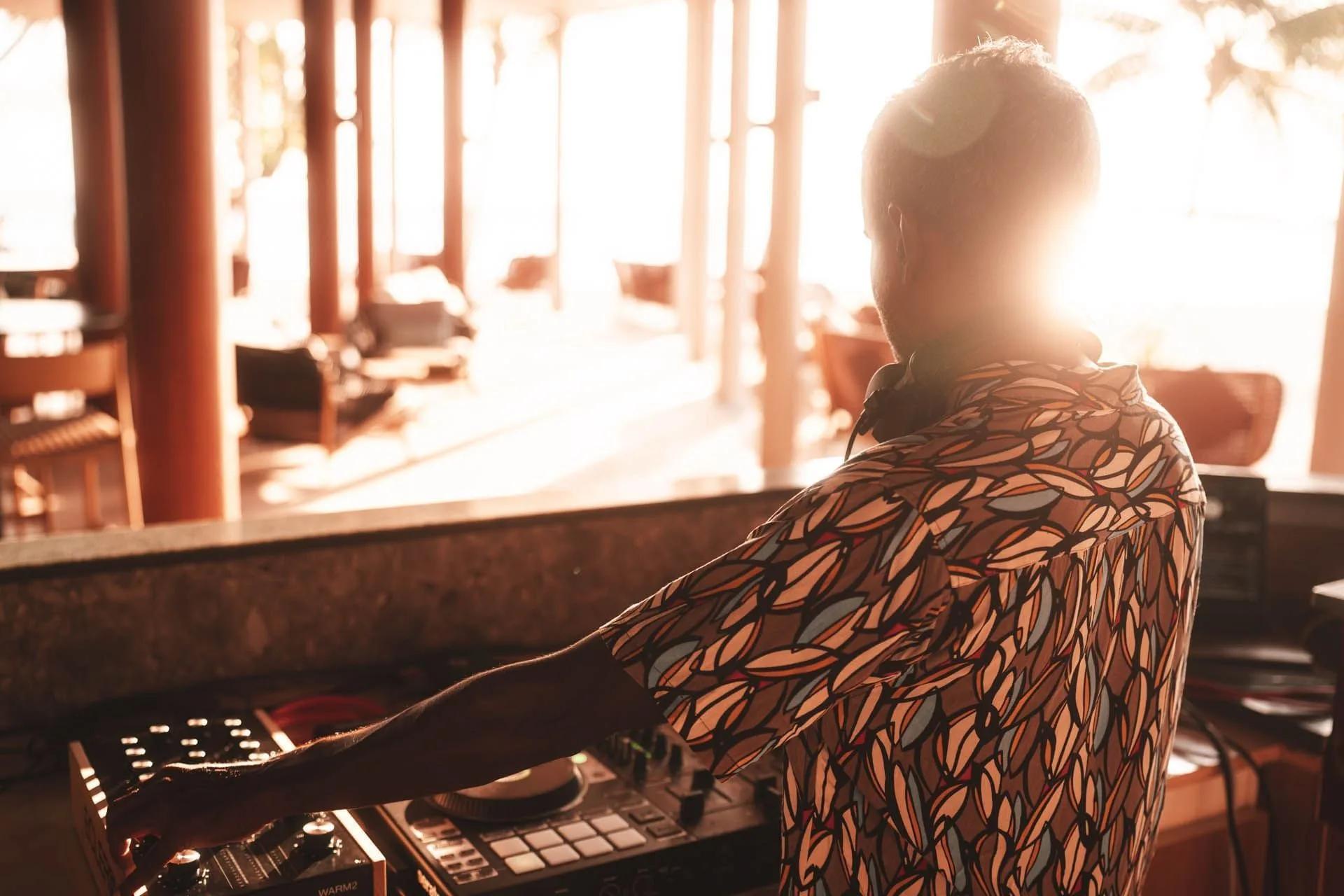 Sting Bar's resident DJ at sunset, ahead of the evening's live music