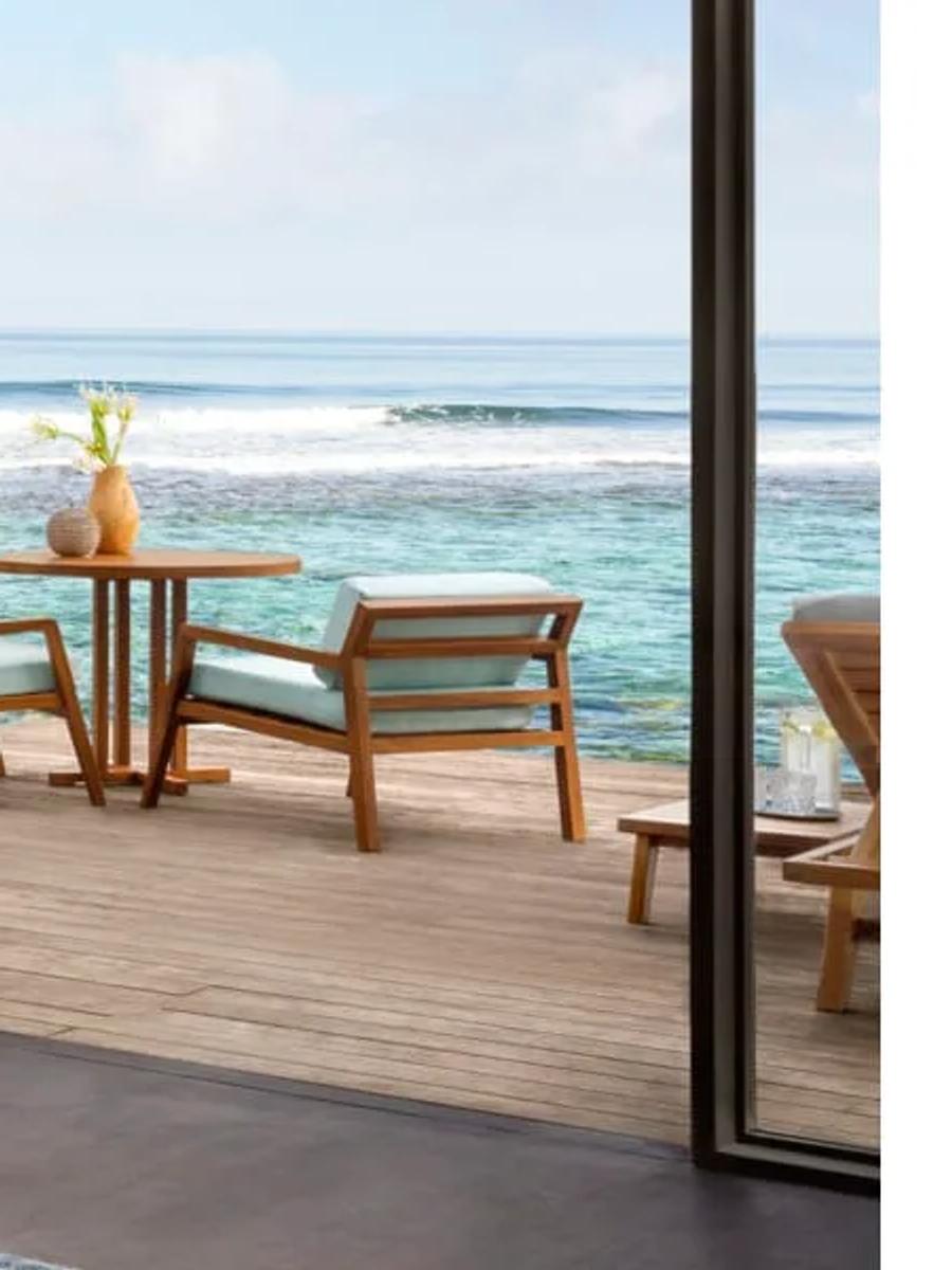 Ocean Pool Villa bedroom opening onto a private pool with uninterrupted ocean views