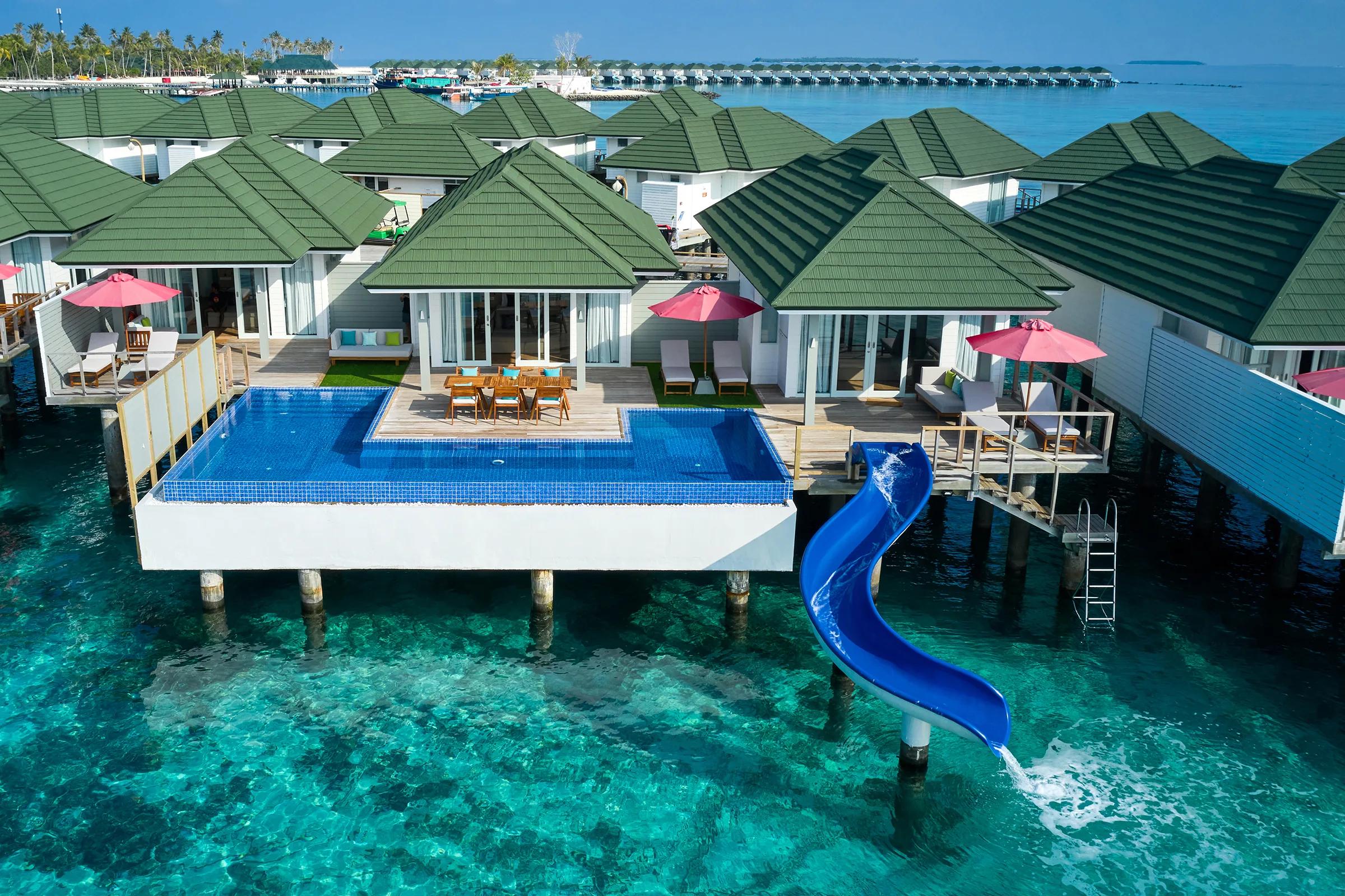 Three Bedroom Lagoon Villa with Pool and Slide's exterior over the lagoon at Siyam World