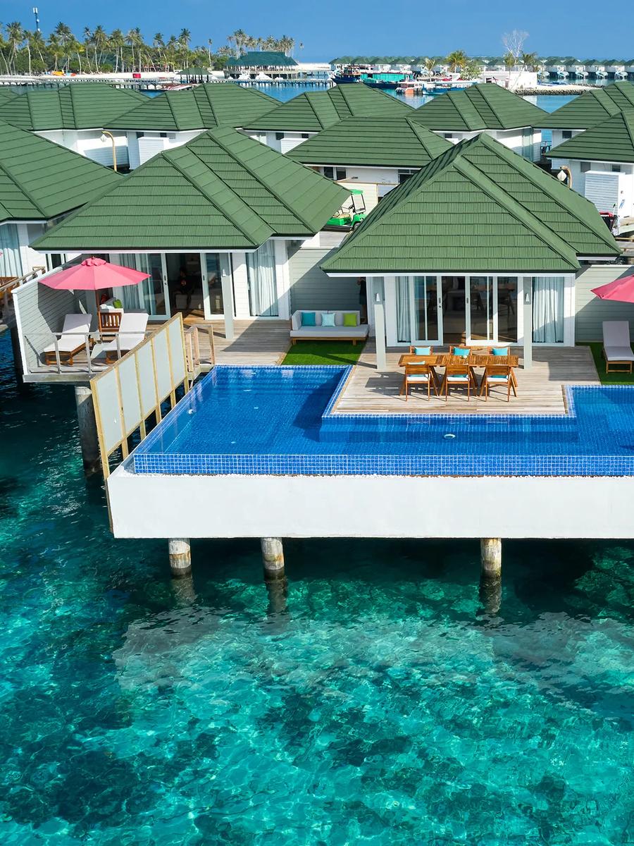 Three Bedroom Lagoon Villa with Pool and Slide's exterior over the lagoon at Siyam World