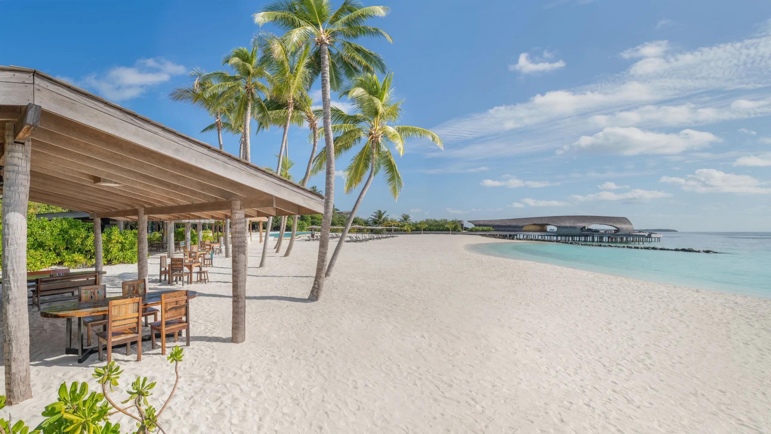 The beachside seating area of Crust & Craft, the resort's family-friendly pizzeria