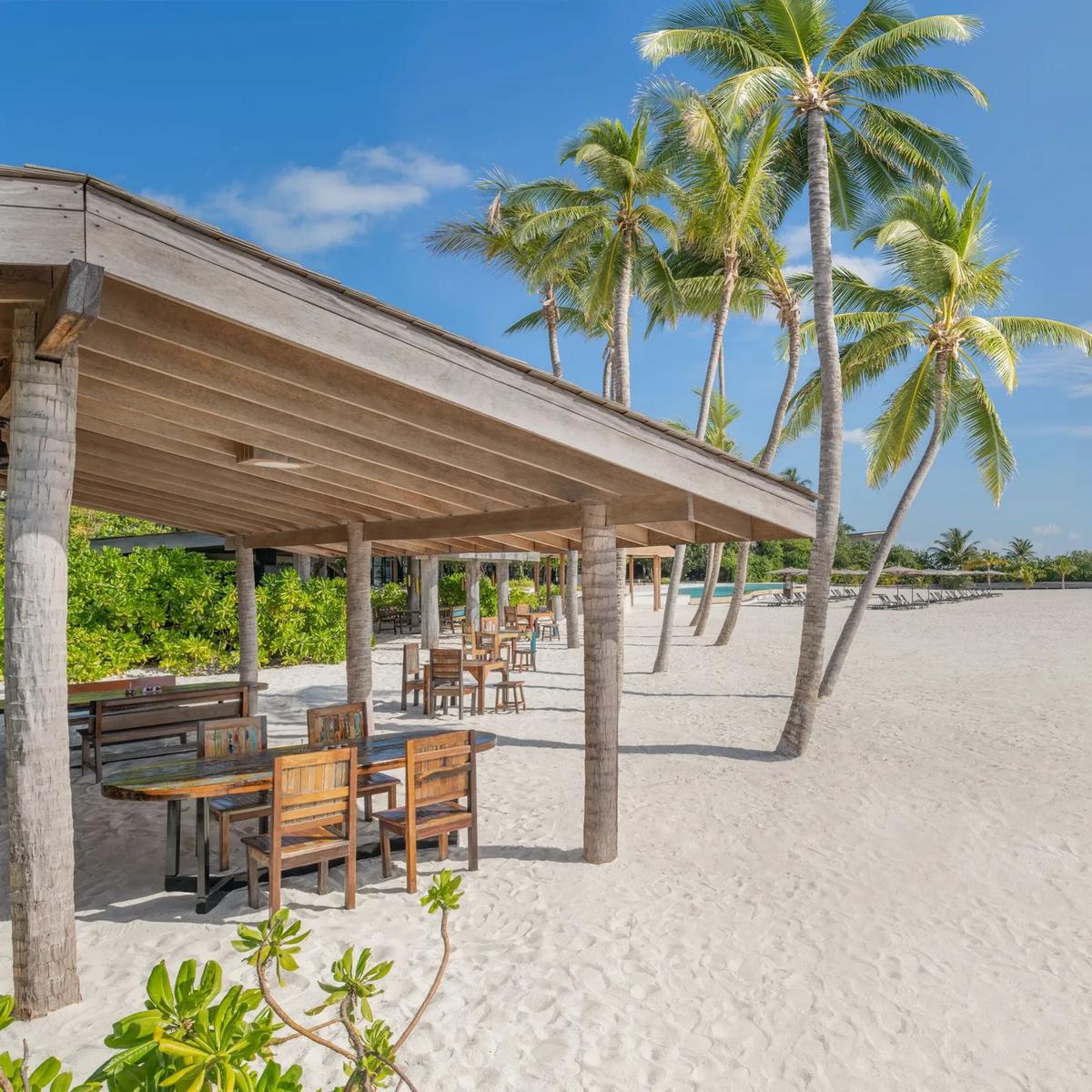 The beachside seating area of Crust & Craft, the resort's family-friendly pizzeria