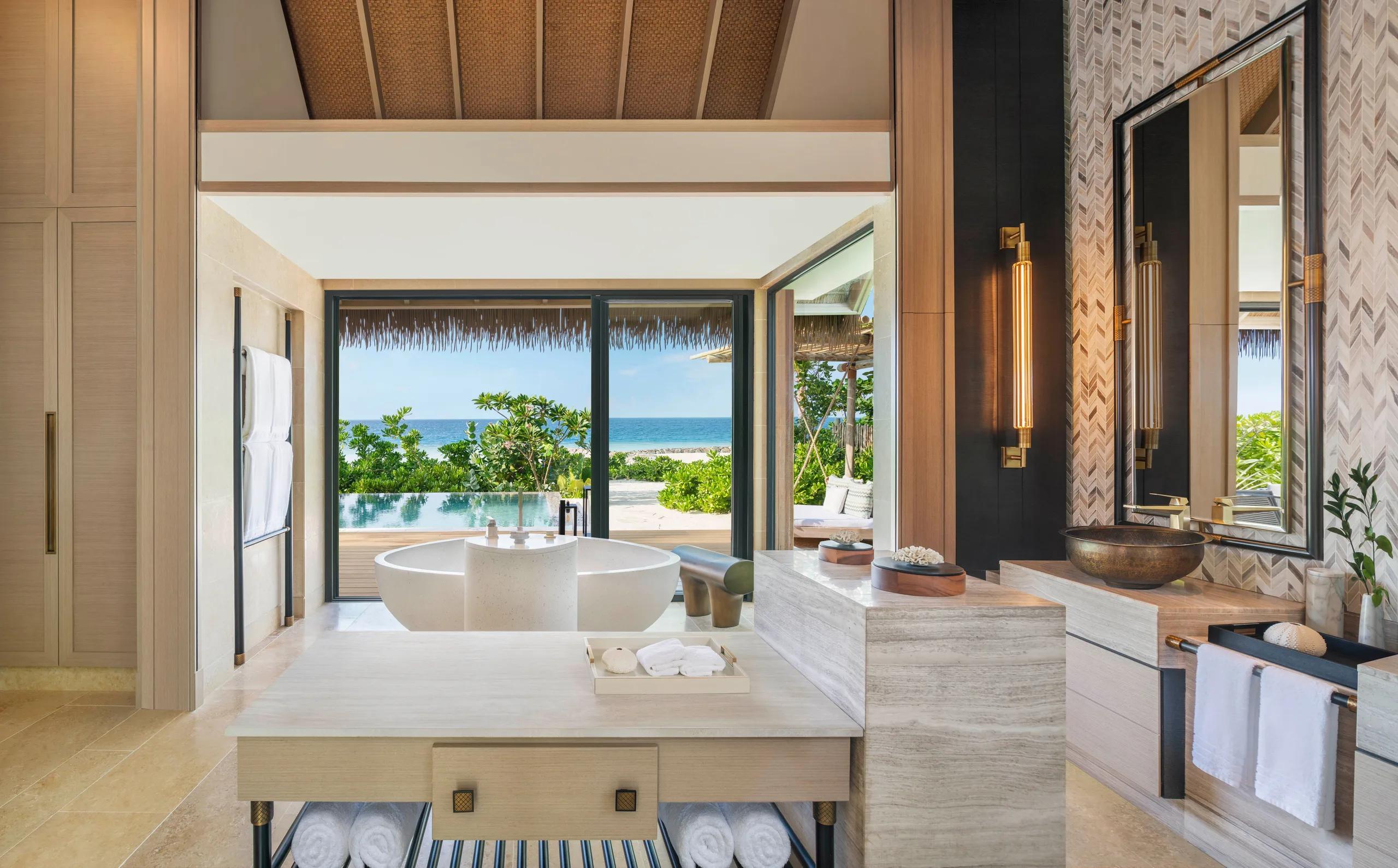 The bathroom of a Beach Villa at Waldorf Astoria Maldives Ithaafushi