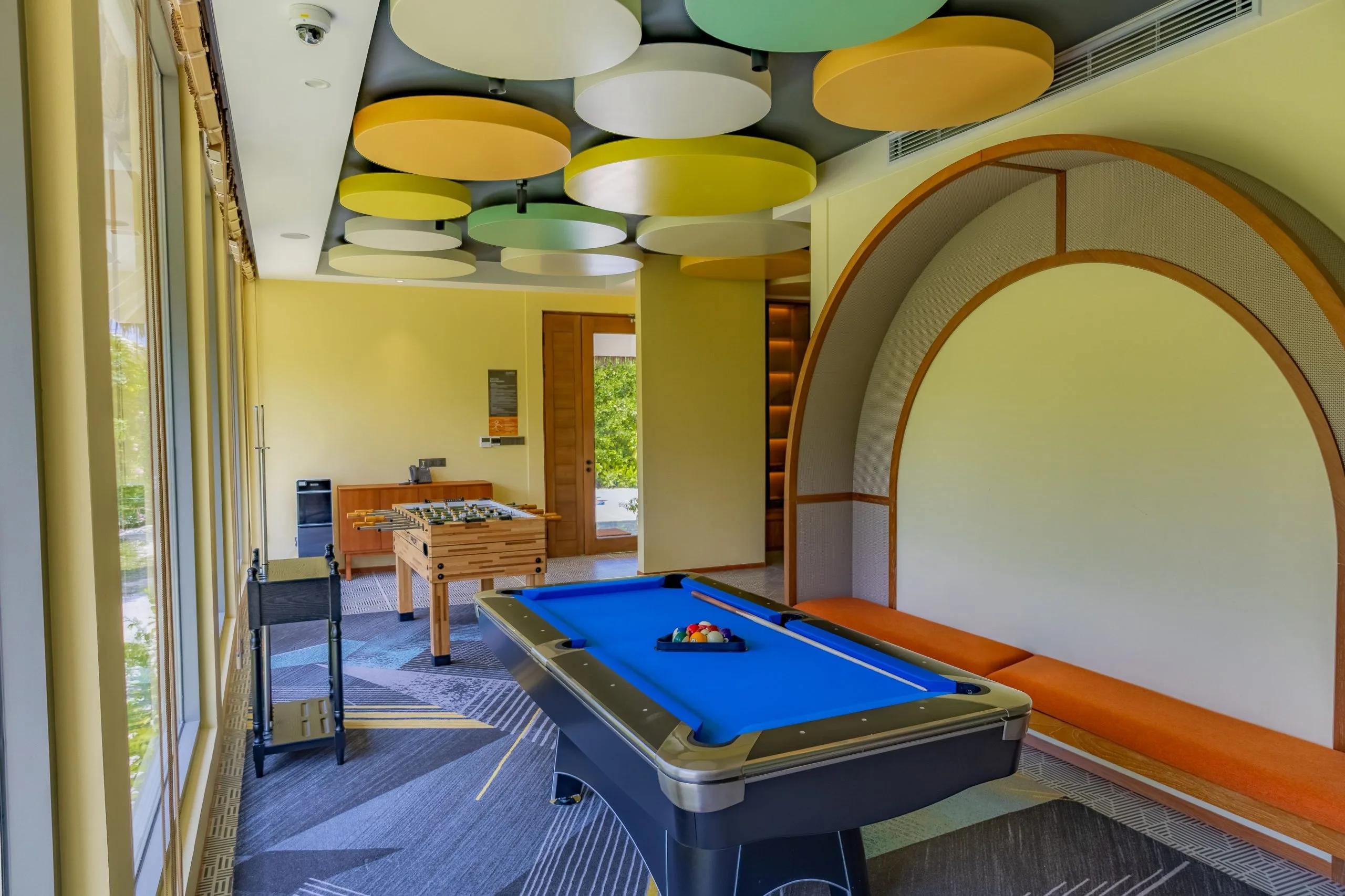 The interior of the Teens' Club at dusitD2 Feydhoo Maldives