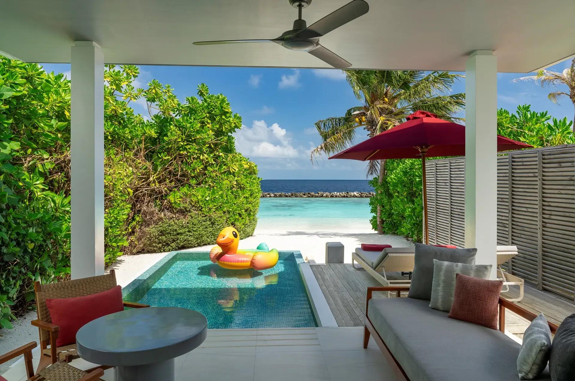 A Beach Suite with Pool's terrace and private plunge pool, viewed from the covered lounge