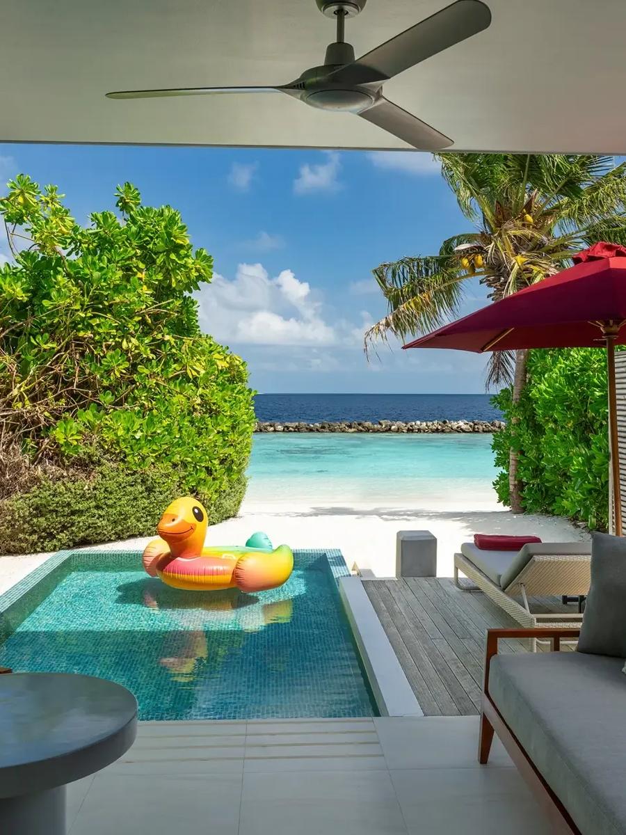 A Beach Suite with Pool's terrace and private plunge pool, viewed from the covered lounge