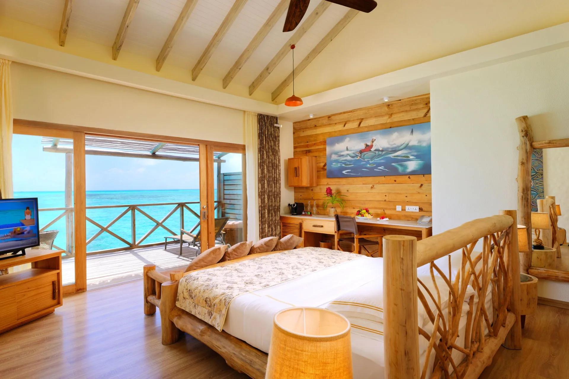 A Lagoon Villa (Manta Villa) at You & Me Maldives, one of 42 overwater units facing sunrise