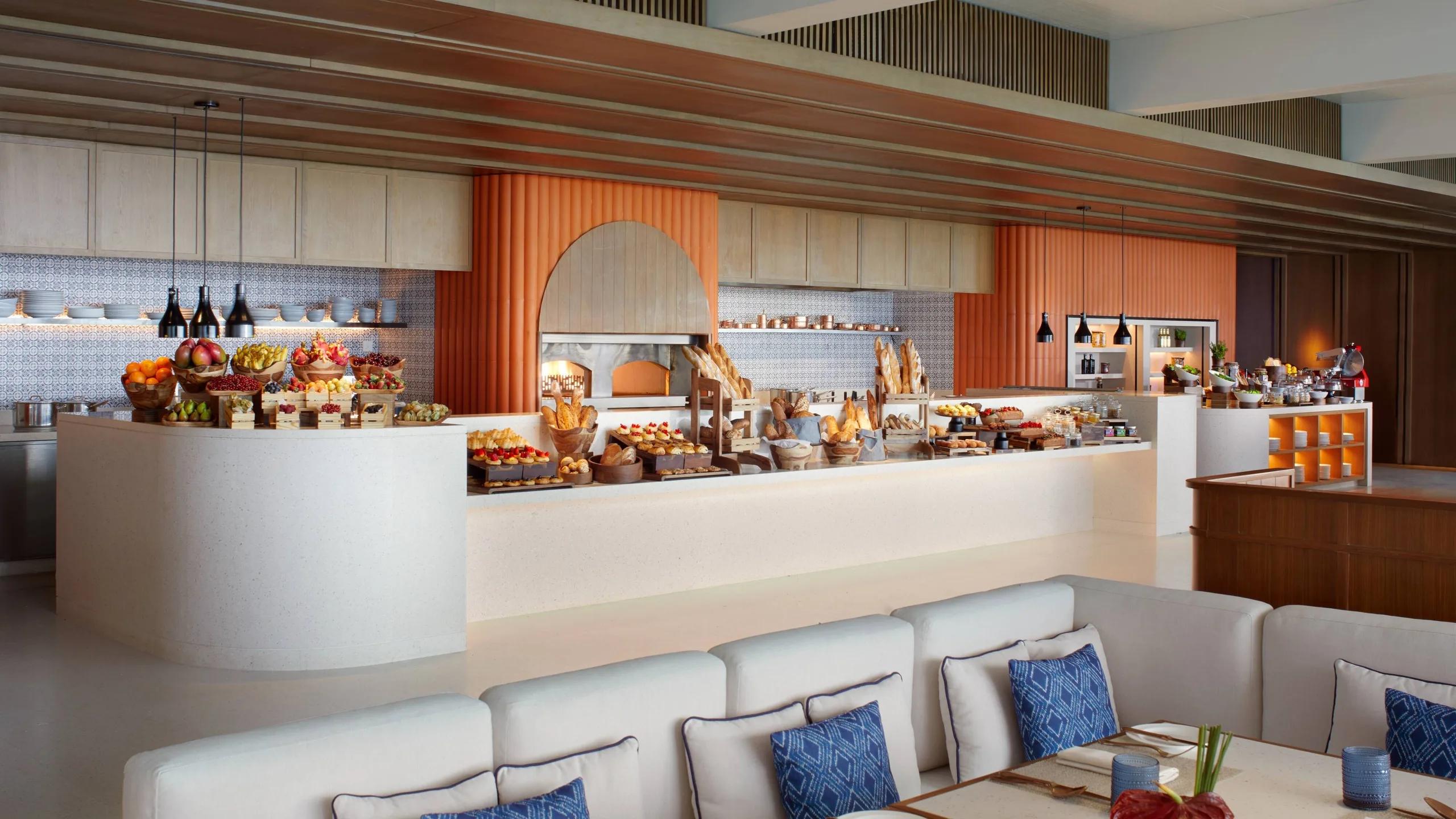 A breakfast buffet with a wood-fired oven, fresh bread and fruit — stands in for Arabesque, which has no dedicated photography on the official site