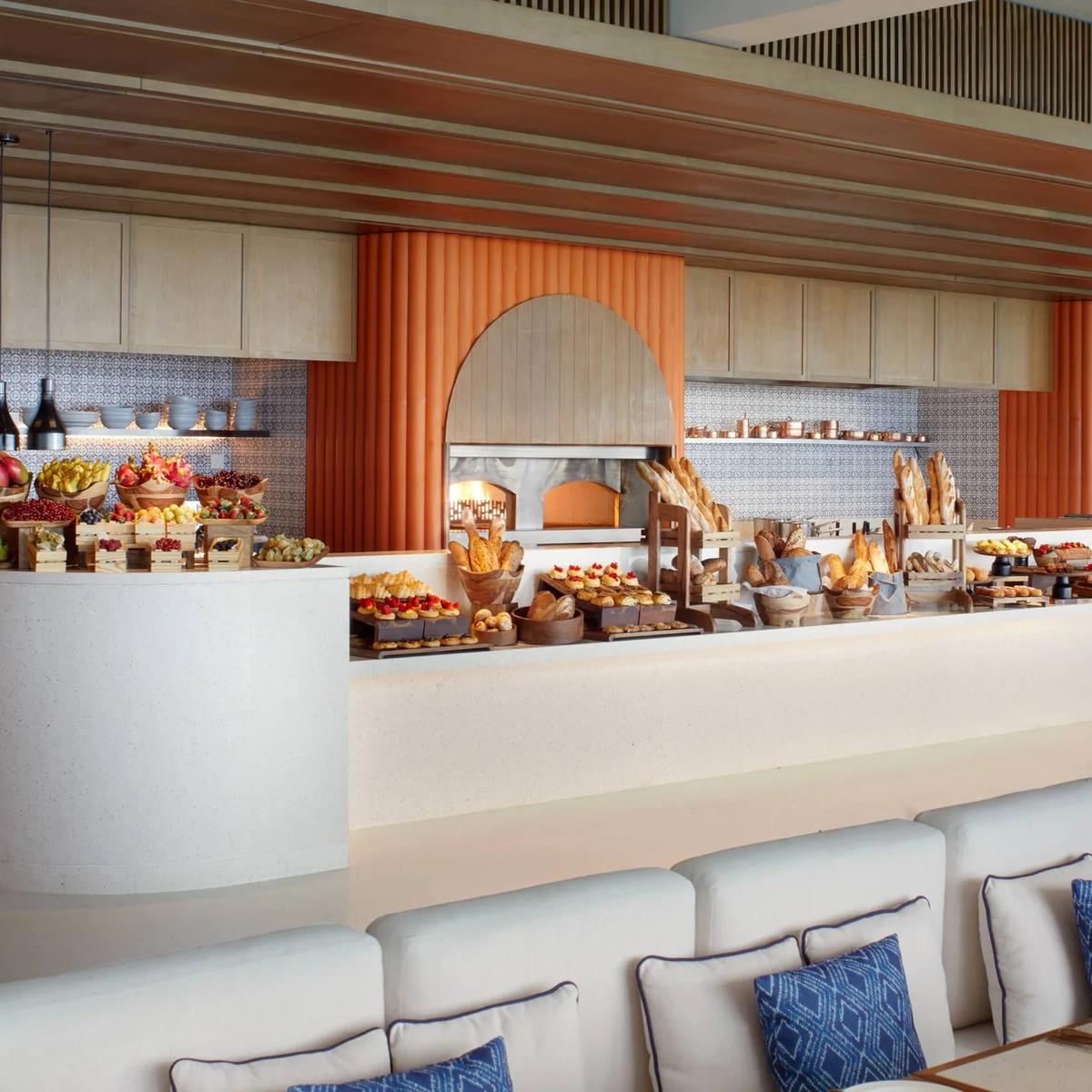 A breakfast buffet with a wood-fired oven, fresh bread and fruit — stands in for Arabesque, which has no dedicated photography on the official site