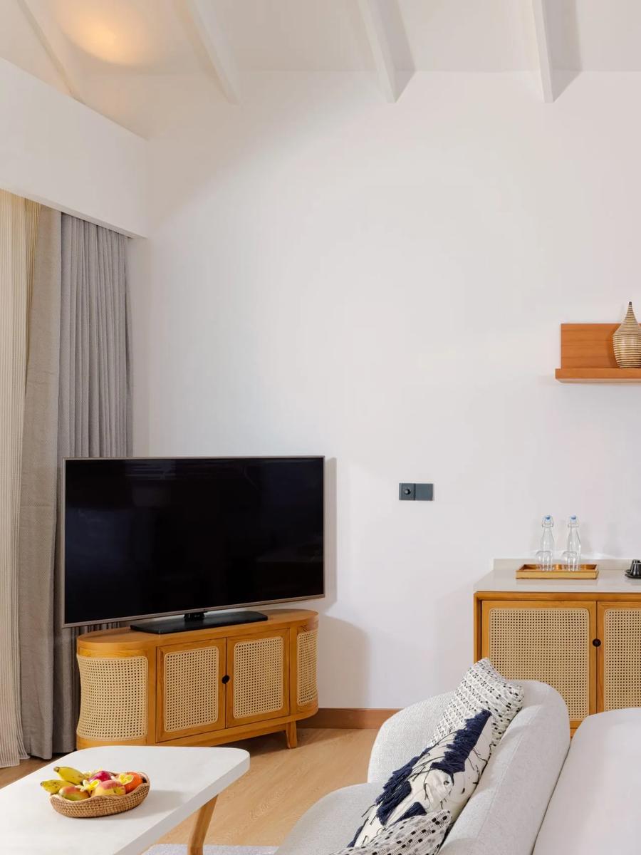 The king bedroom of a Beach Villa at dusitD2 Feydhoo Maldives
