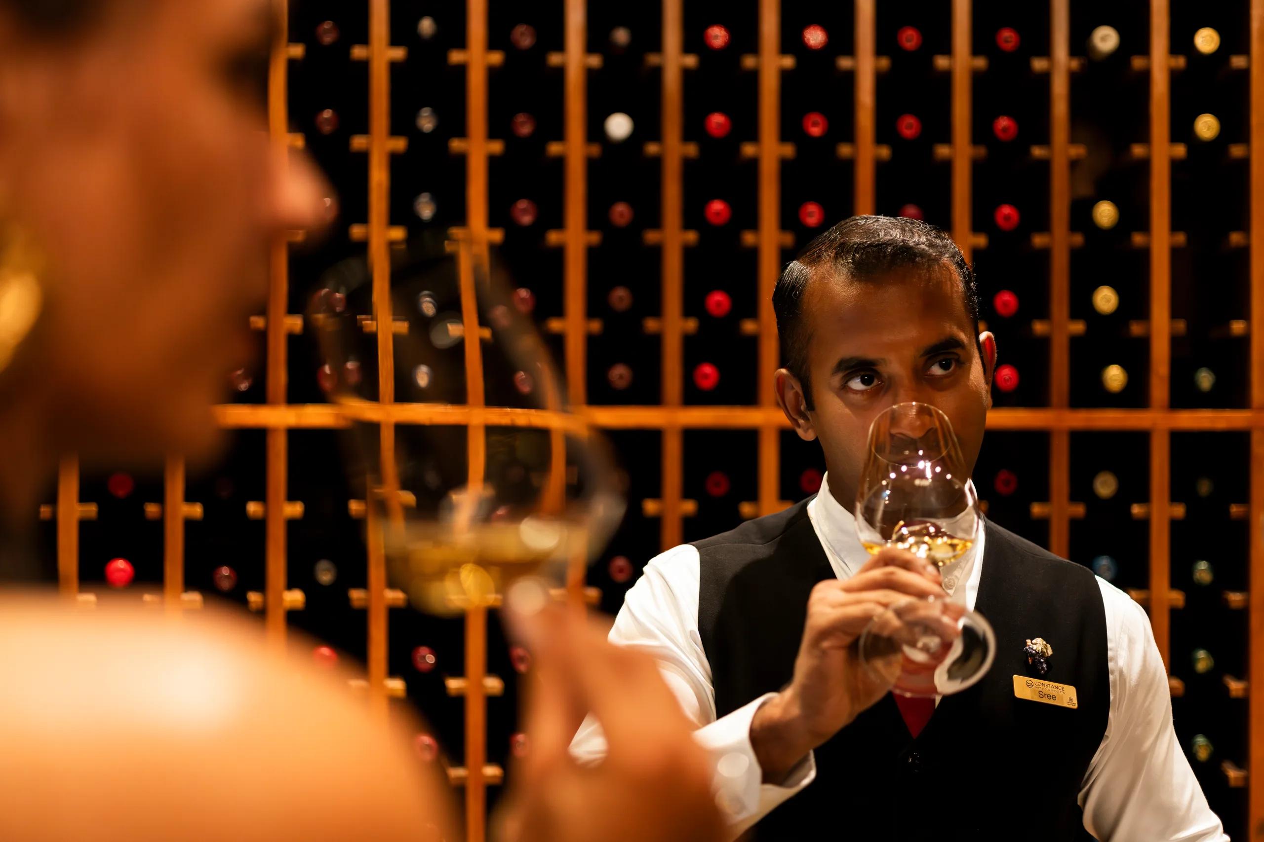 A private tasting dinner inside a resort's wine cellar