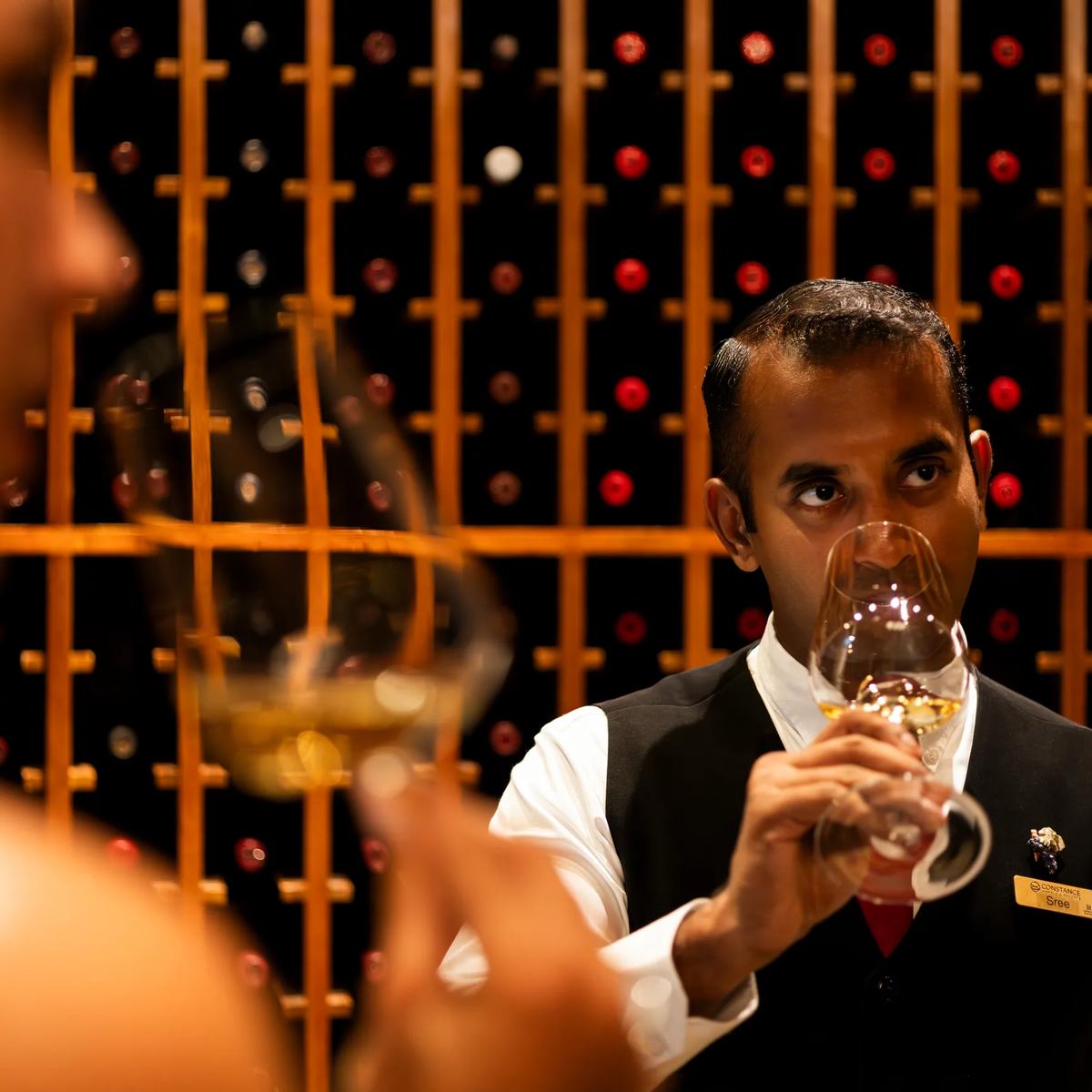 A private tasting dinner inside a resort's wine cellar