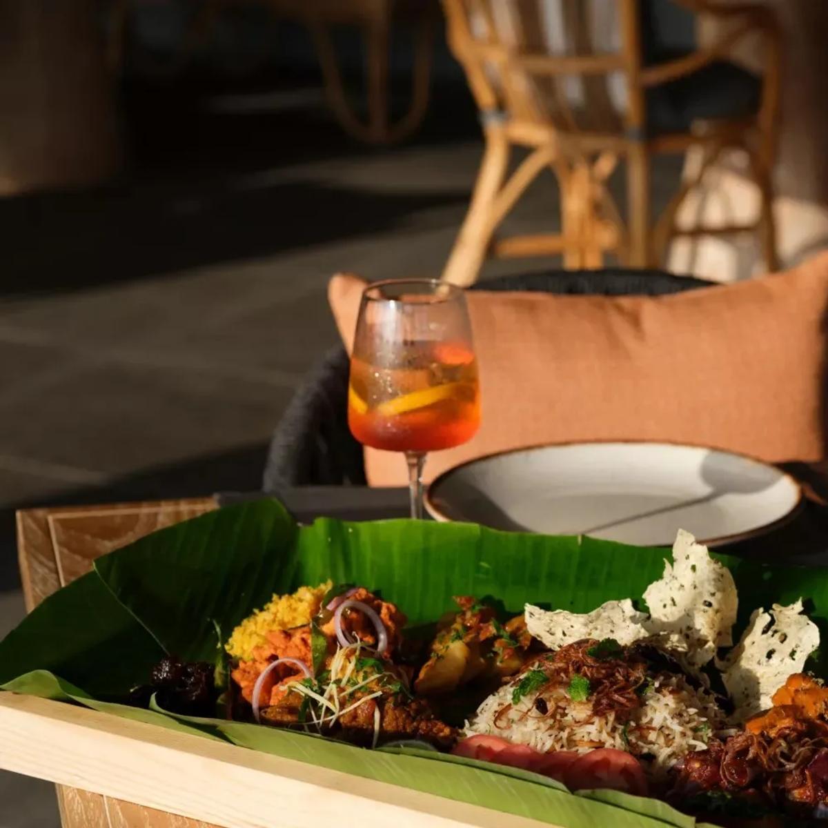 A banana-leaf platter of Indian, Sri Lankan and Maldivian dishes at Thari Restaurant, Noku Maldives