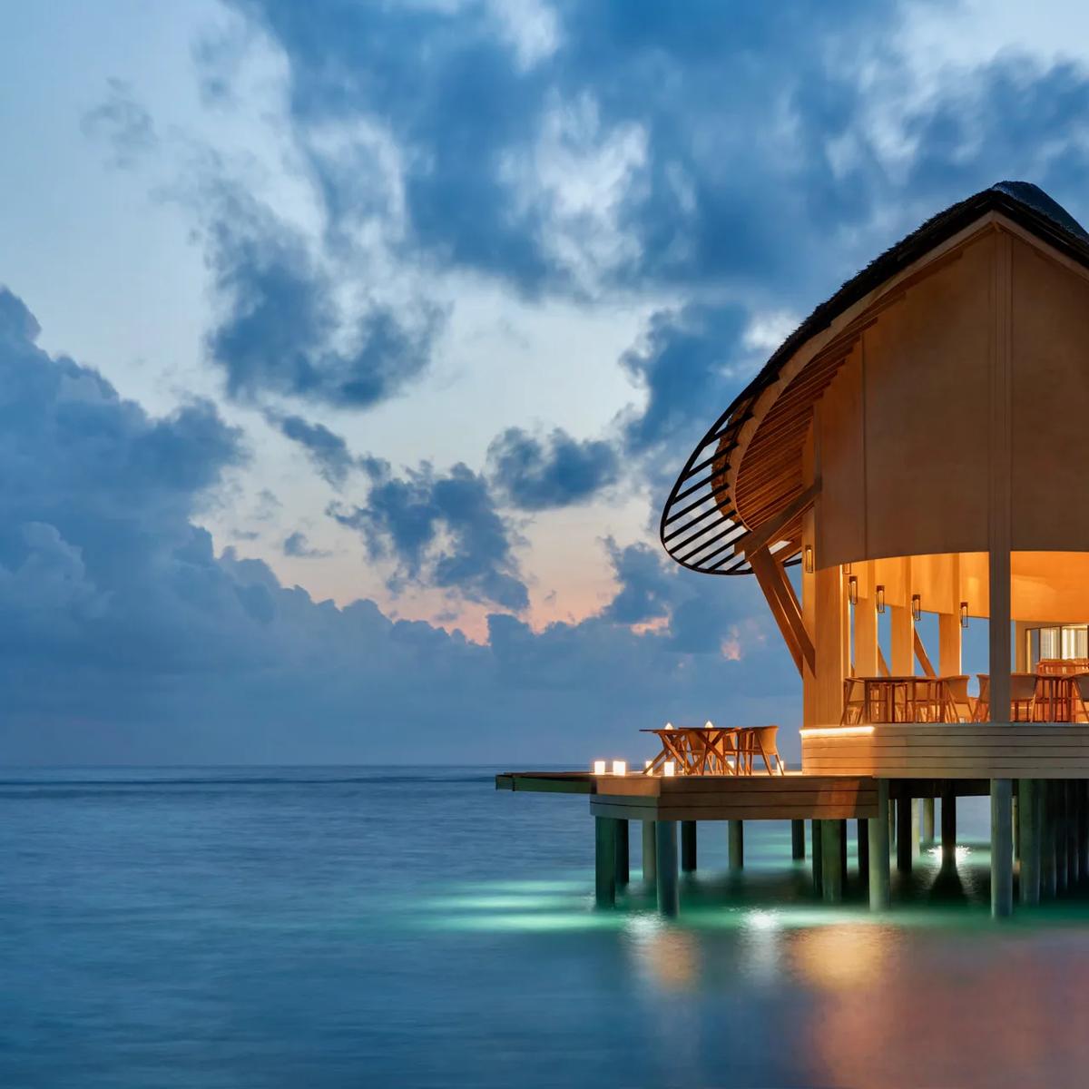 A table setting at Origin, the resort's overwater fine-dining Italian restaurant