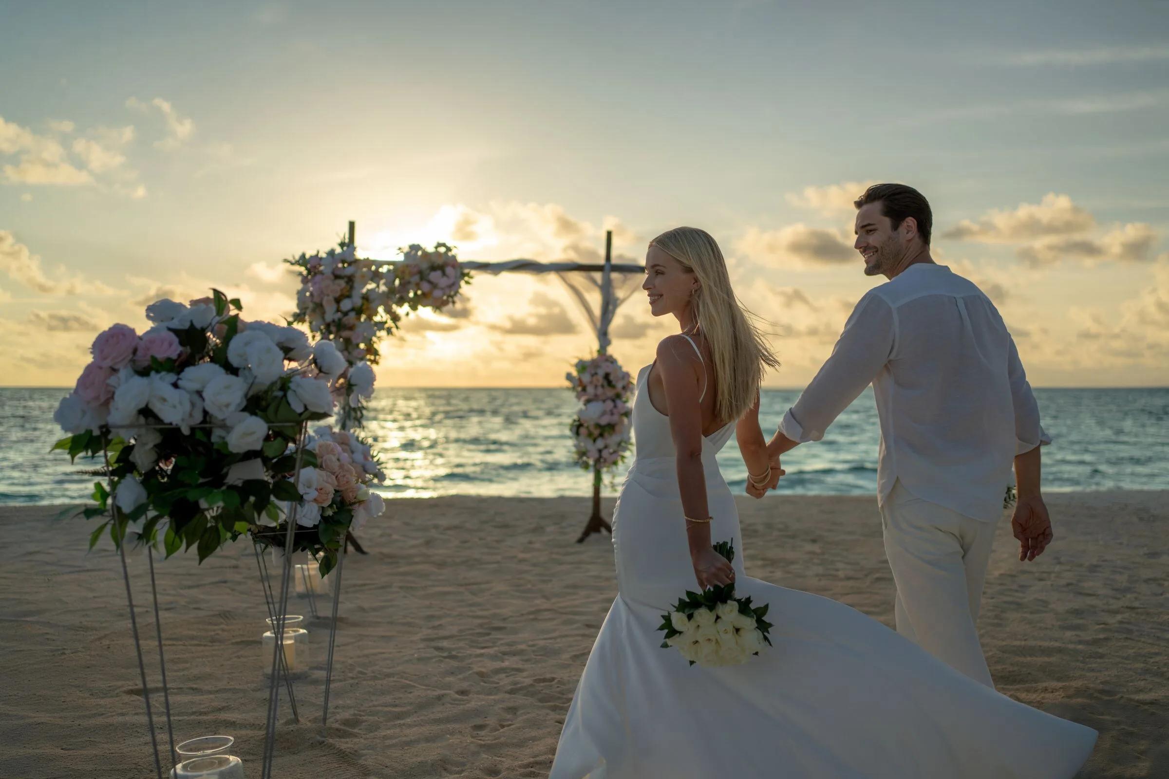 A wedding ceremony set up on the beach at JW Marriott Maldives Kaafu Atoll