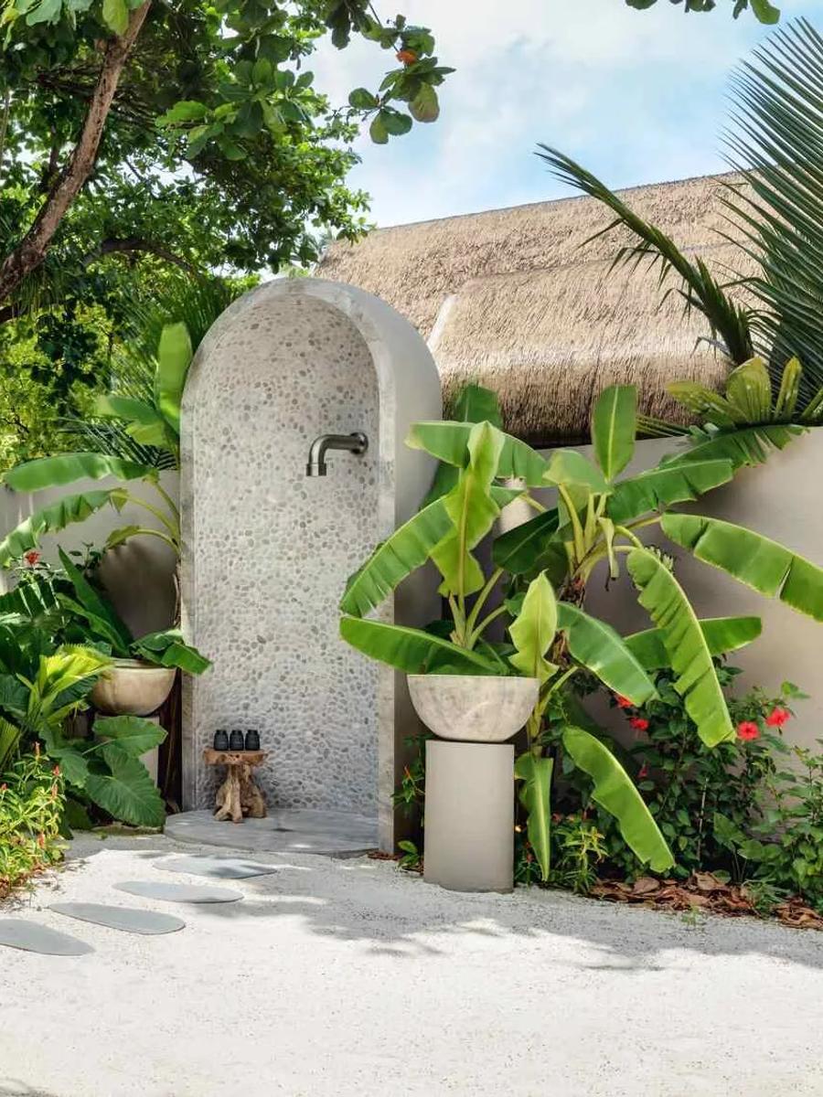 The outdoor shower of a Grand Beach Pool Villa at Joali Being — the Two Bedroom Wellbeing Beach Pool Residence has no dedicated published photo, so its closest sibling category stands in here