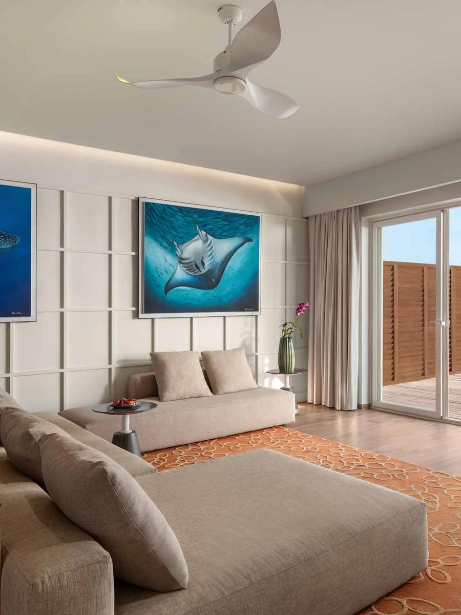 A Superior Water Villa with Pool's deck and 8x3 m pool, set over the lagoon
