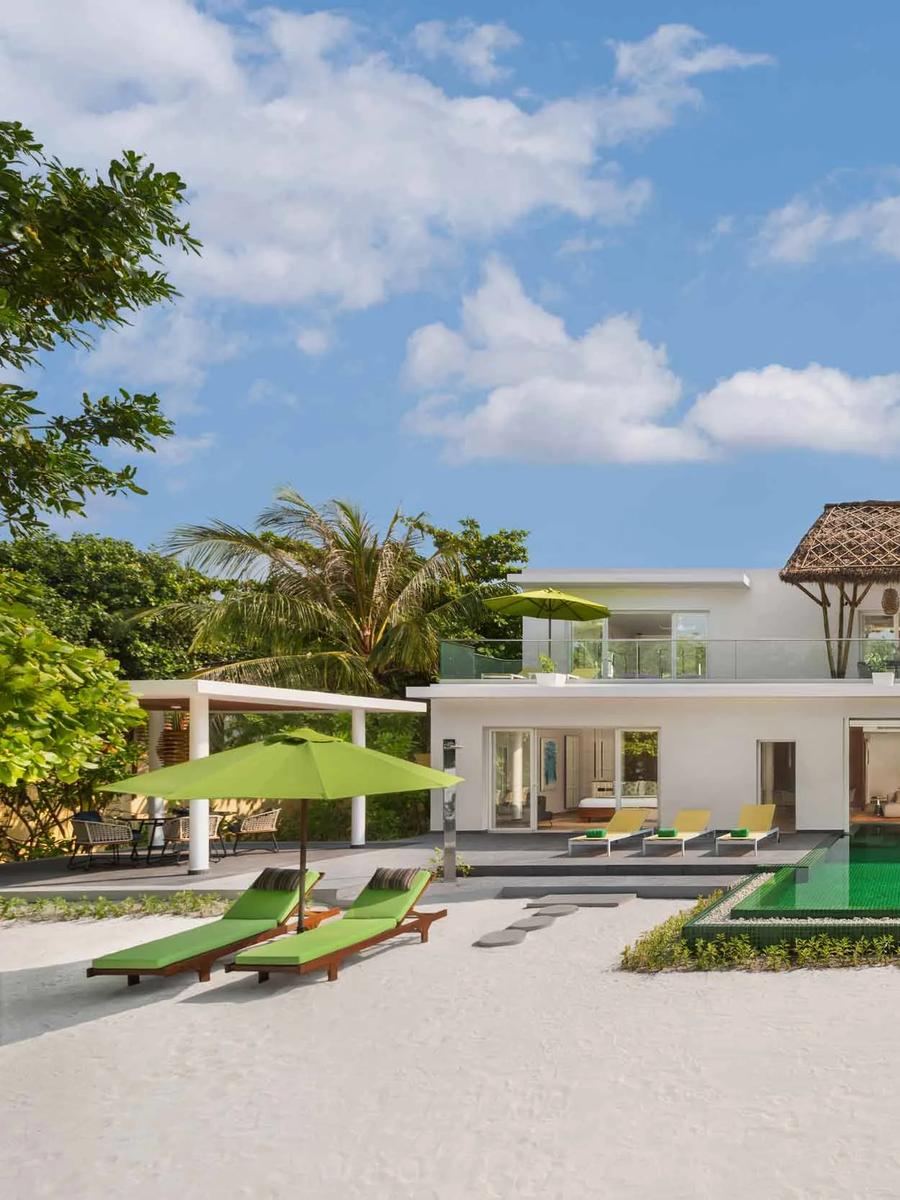 The two-storey Three Bedroom Royal Beach Villa with Pool, its ground floor opening onto the 8x3 m pool