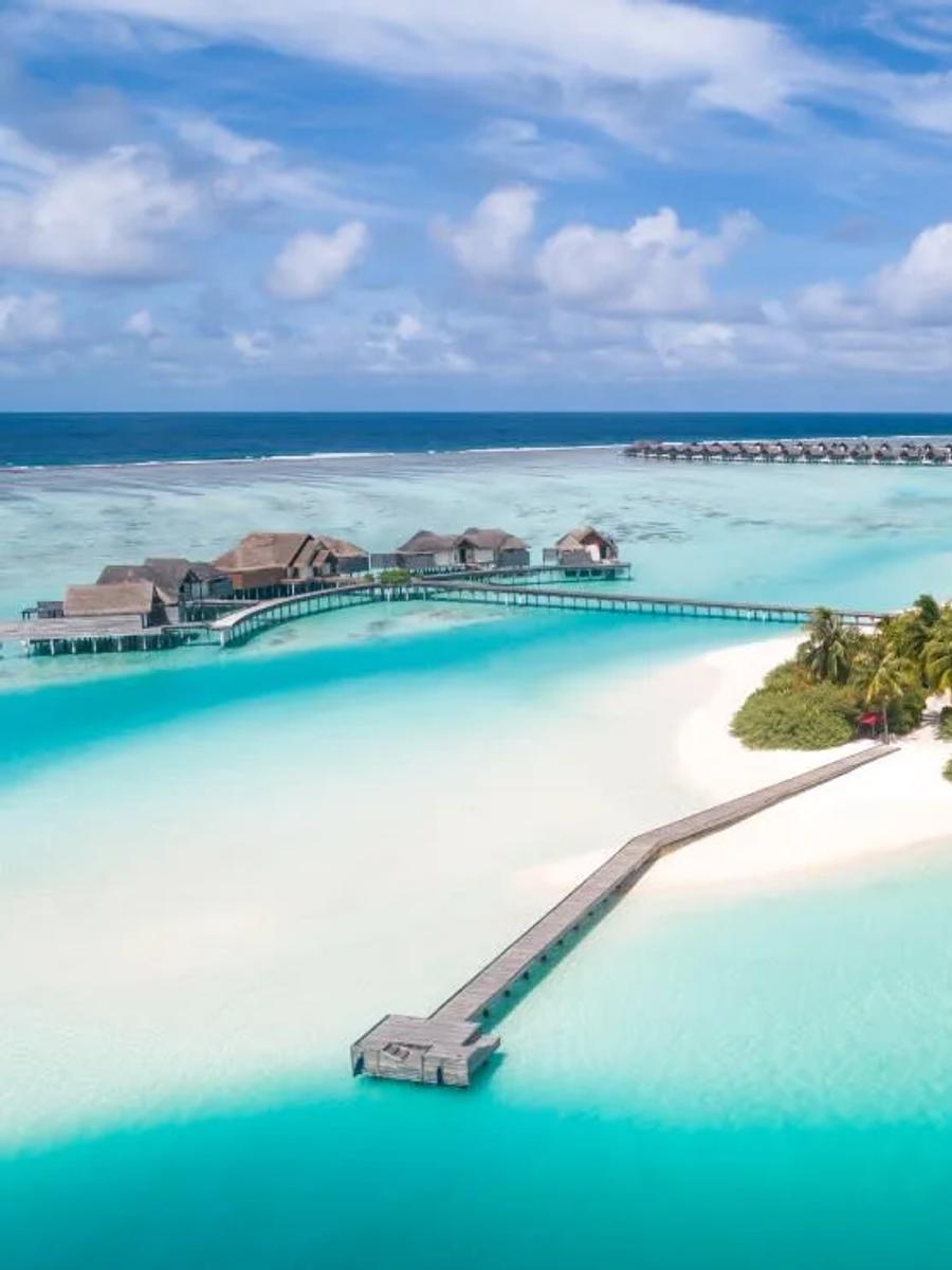 Niyama's Chill and Play islands seen from above, joined by their overwater boardwalk